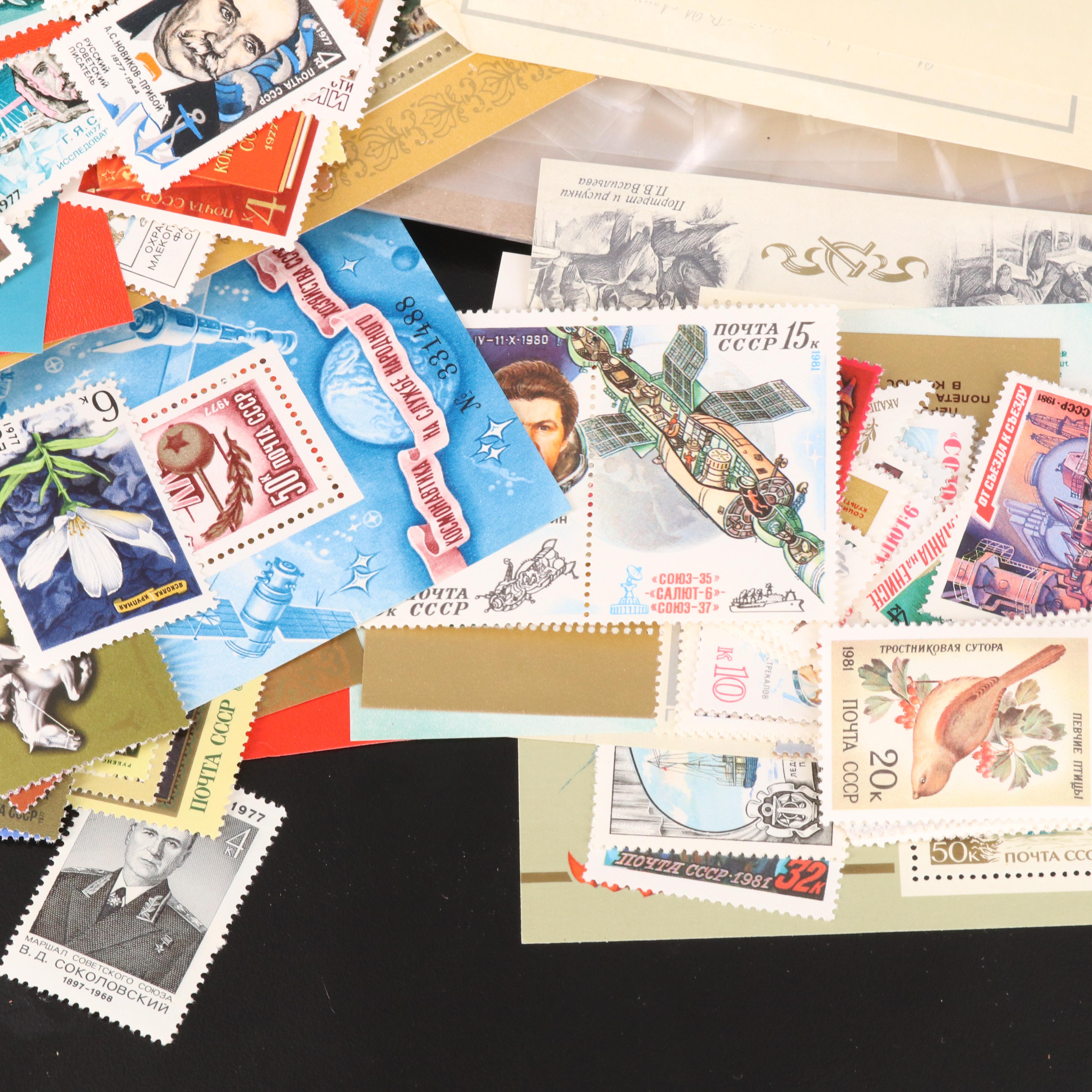 Assortment of Stamp Mounts and Soviet Union Postage Stamps