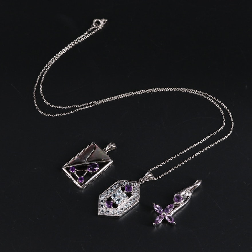 Sterling Silver Pendant Trio Including Mother of Pearl, Amethyst, and Topaz
