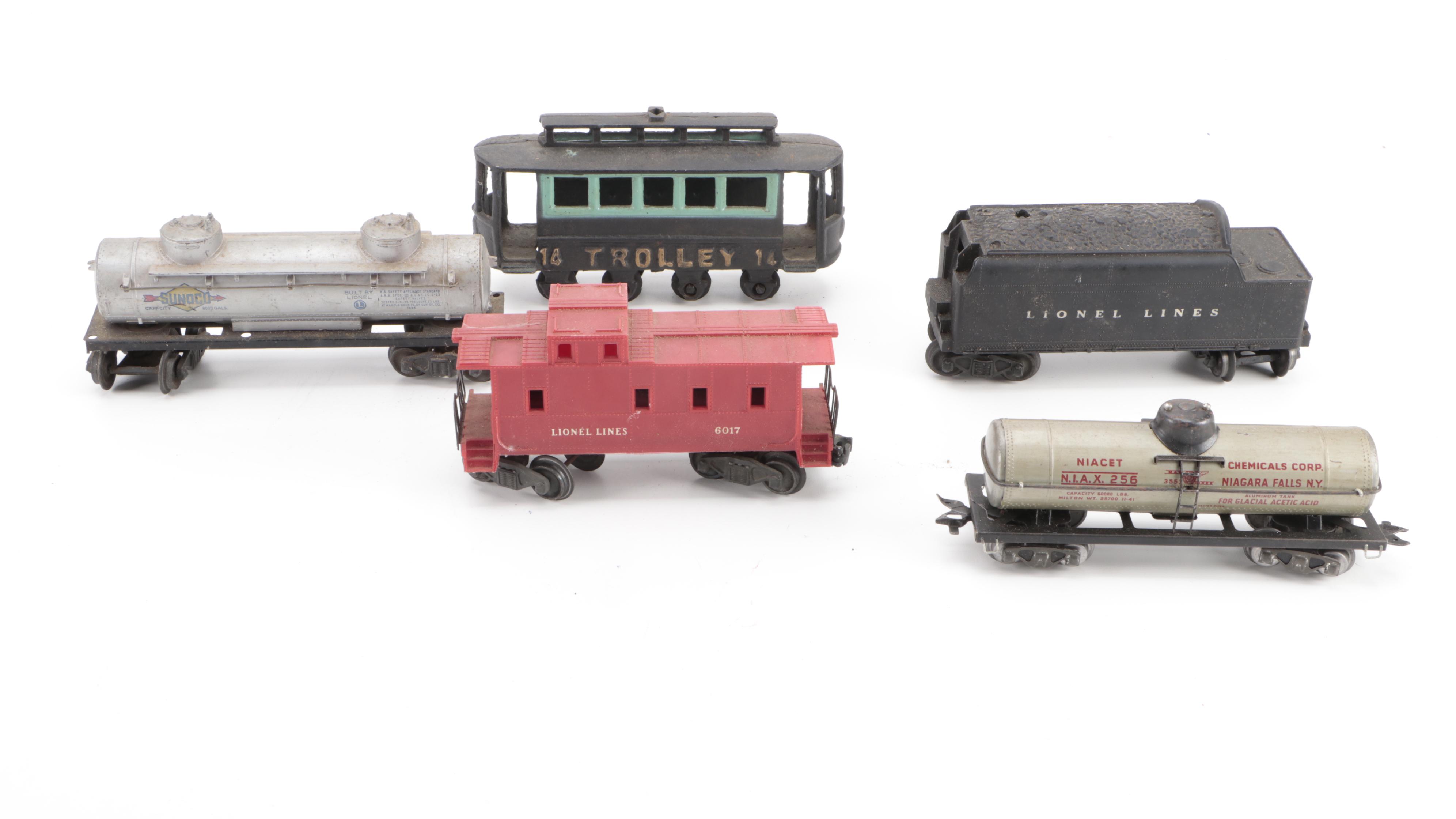 Lionel O Gauge Pressed Steel Locomotive with Other Lionel Trains