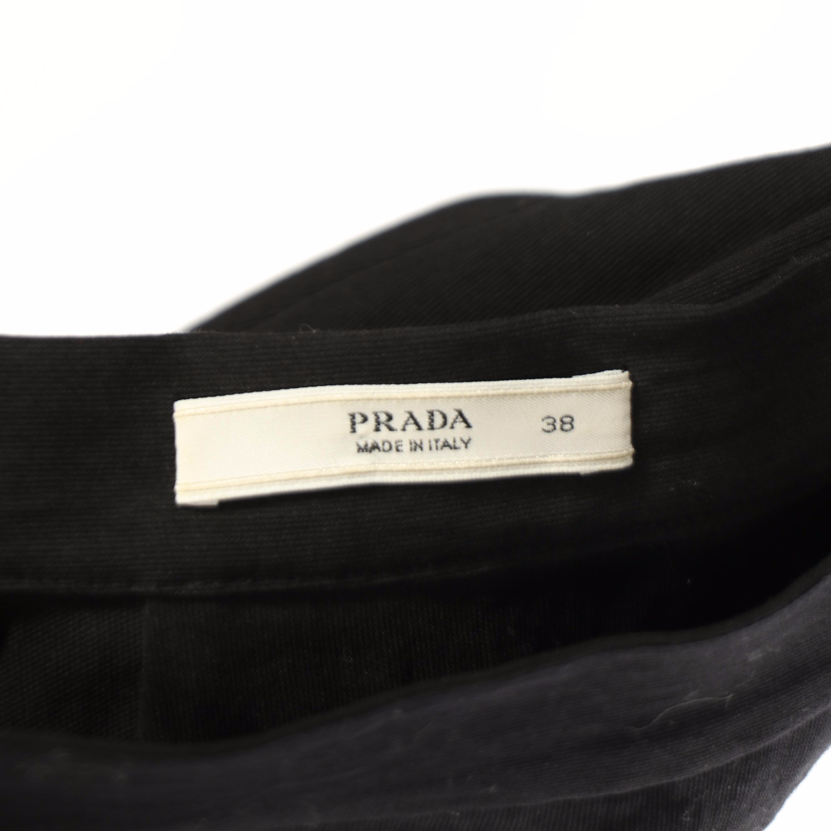 Prada Back Pleat, John Galliano Front Slit, and Opening Ceremony Cutout Skirts