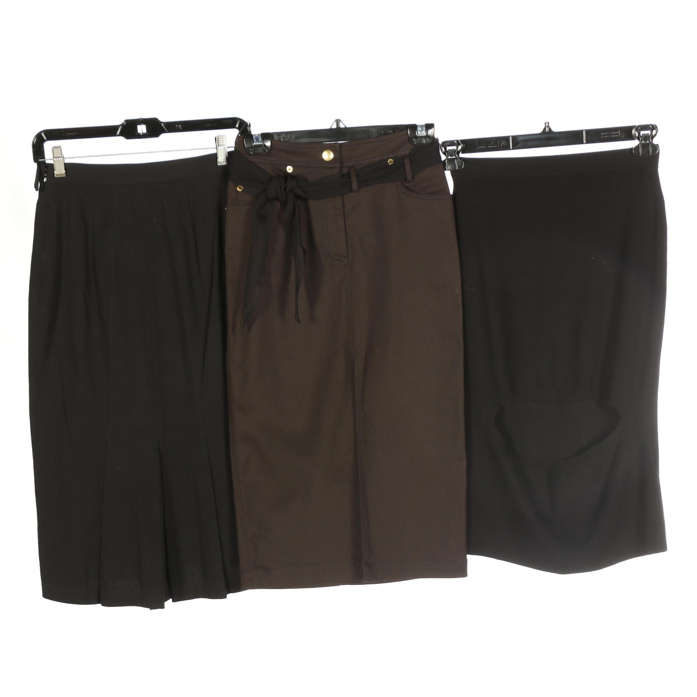 Prada Back Pleat, John Galliano Front Slit, and Opening Ceremony Cutout Skirts