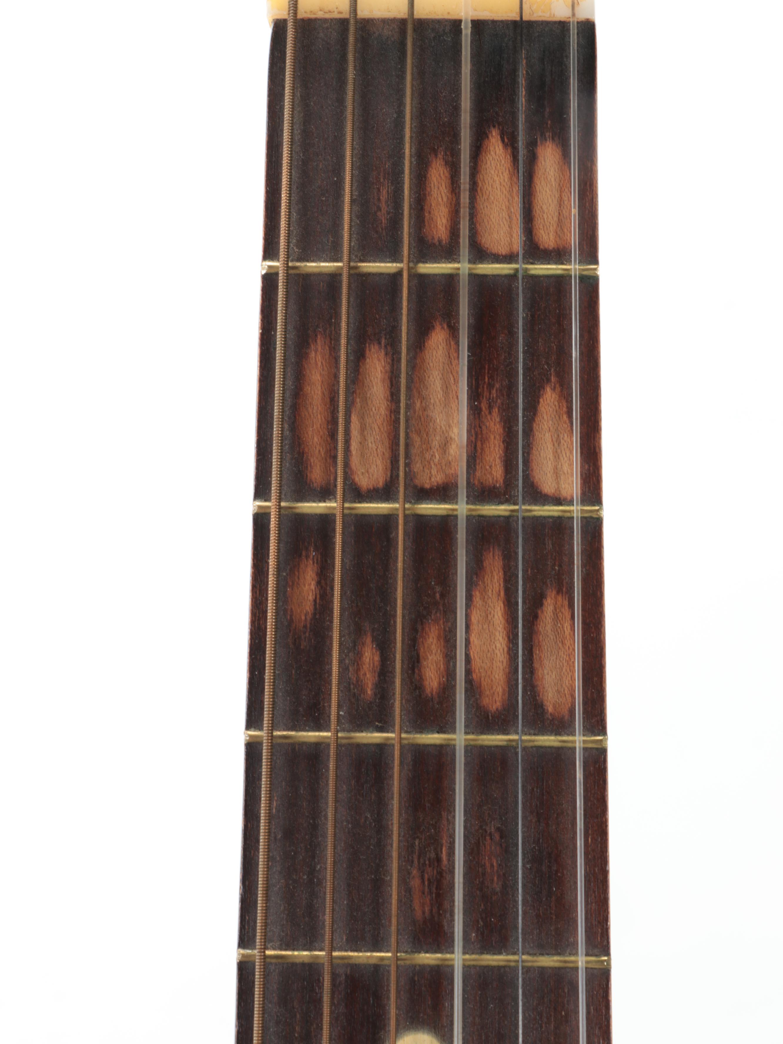 Silvertone Acoustic Guitar with Case and Sheet Music, Late 20th Century