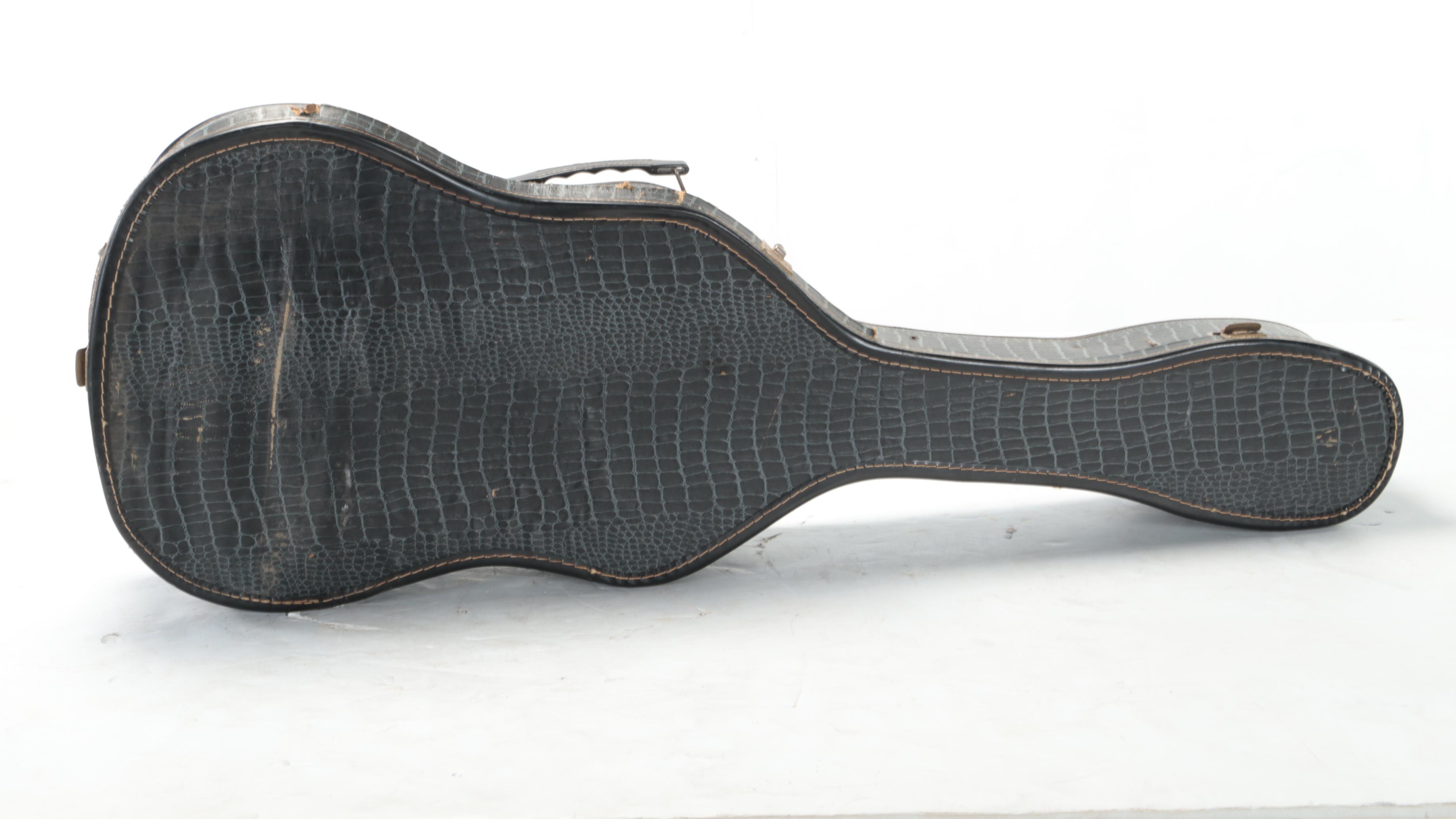 Silvertone Acoustic Guitar with Case and Sheet Music, Late 20th Century