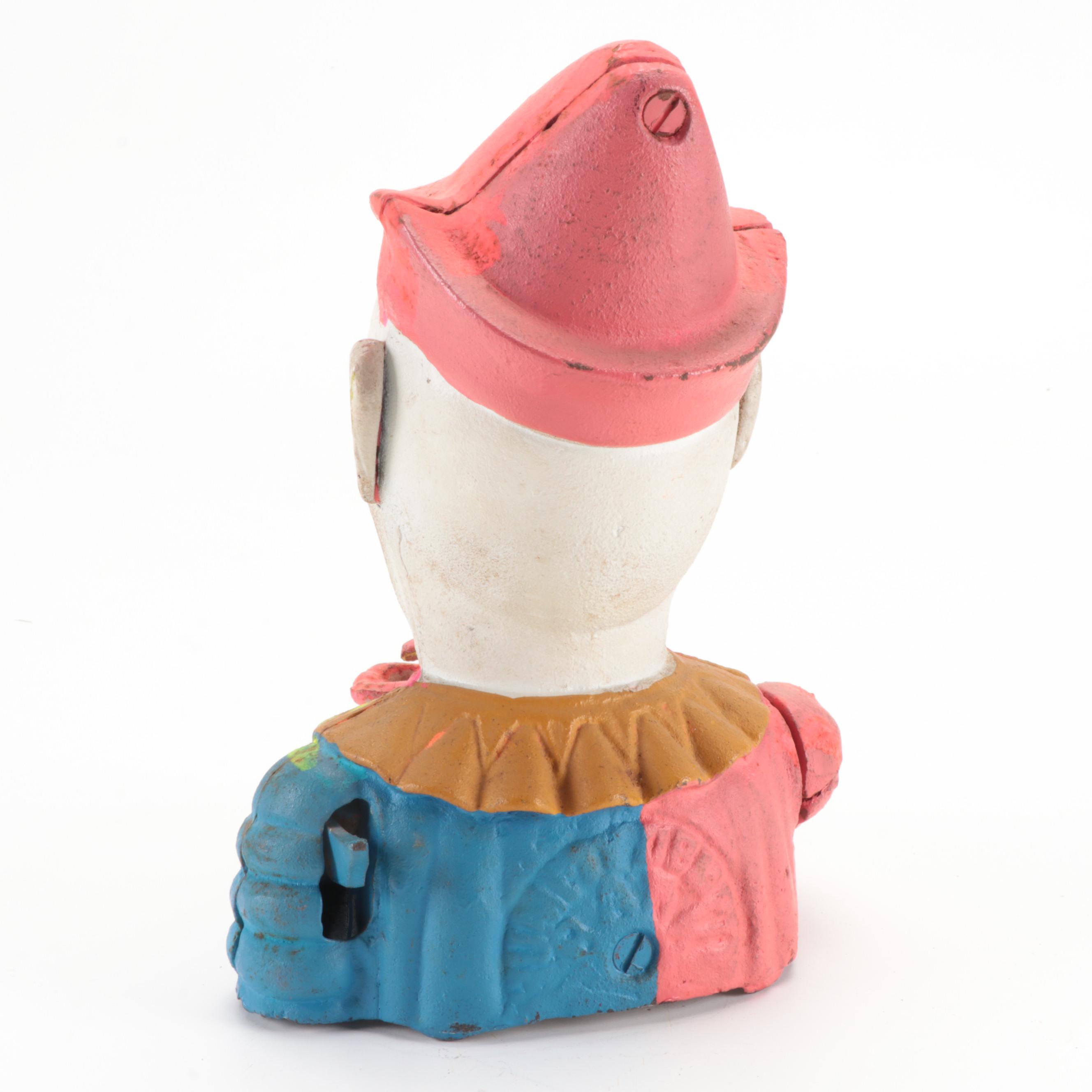 Painted Cast Iron Humpty Dumpty Jester Clown Coin Bank With Soldier Nutcracker