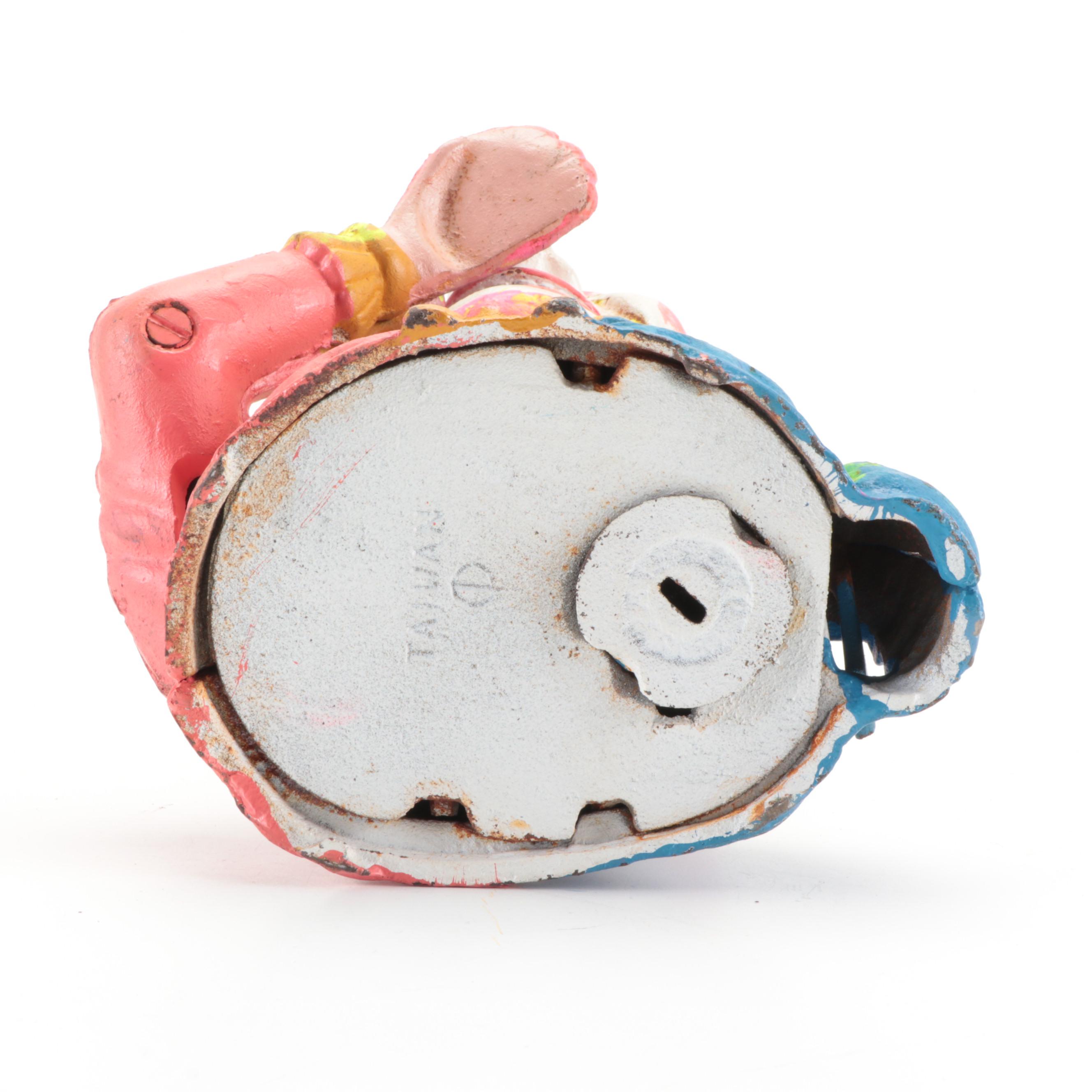 Painted Cast Iron Humpty Dumpty Jester Clown Coin Bank With Soldier Nutcracker