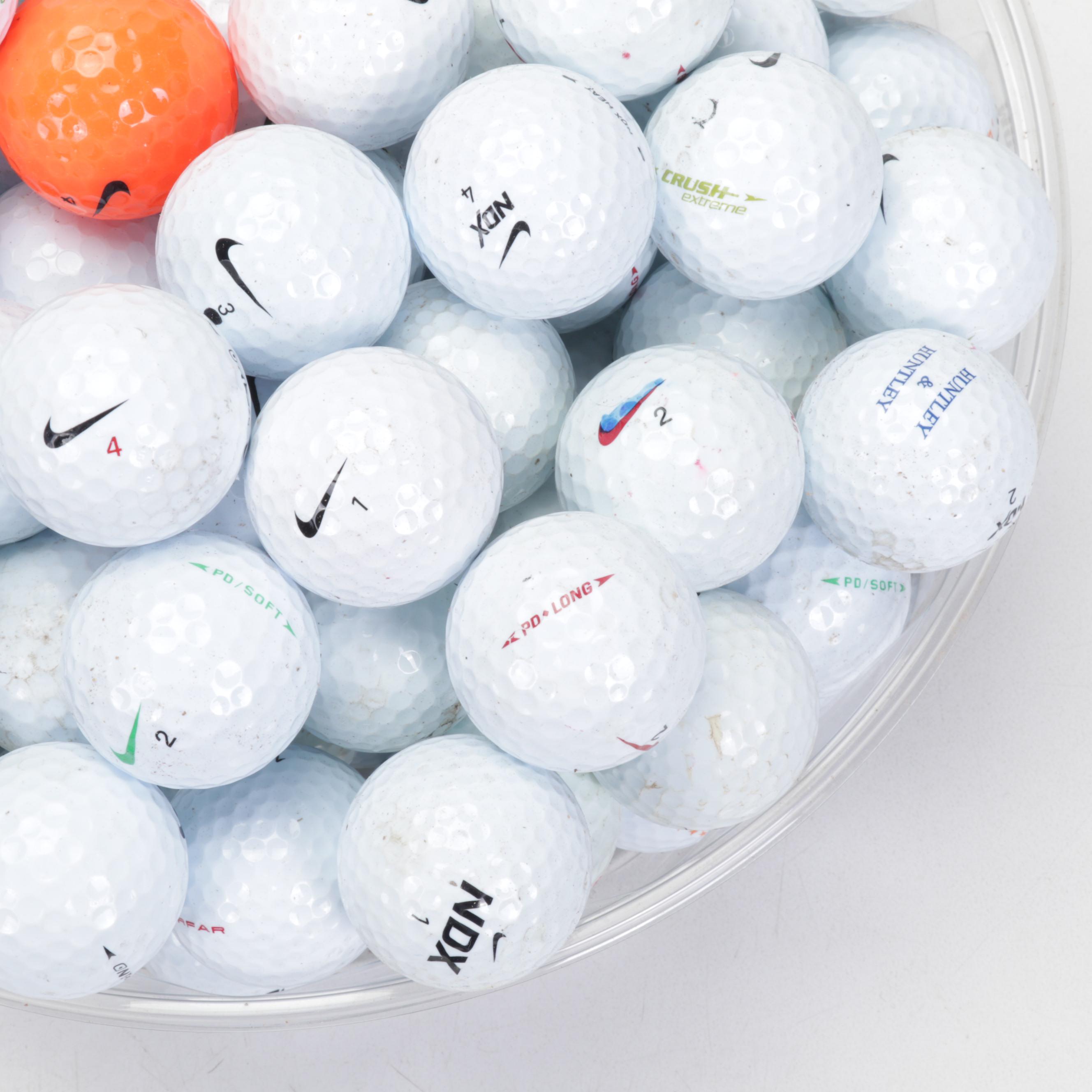 One Hundred Golf Balls Including Nike and More