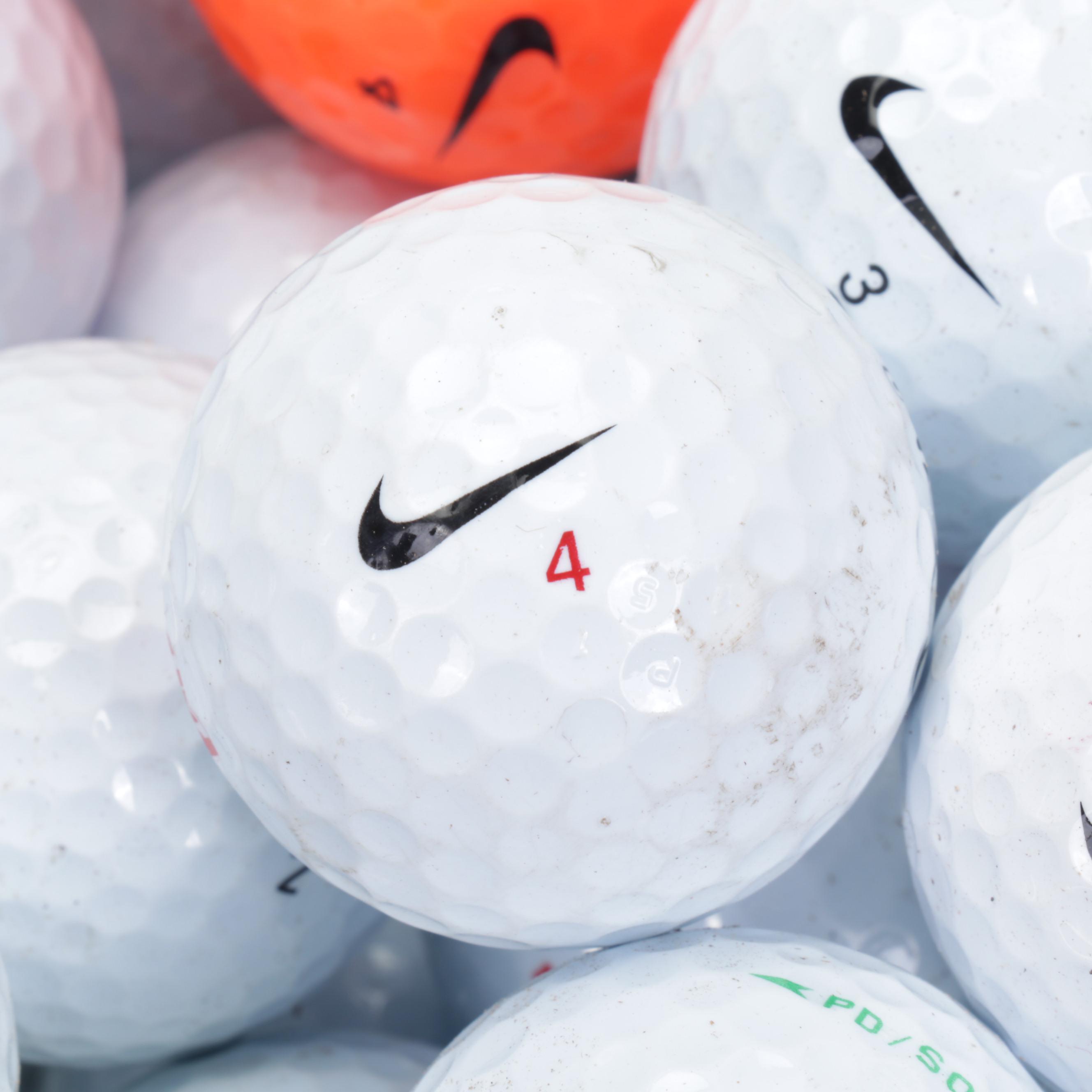 One Hundred Golf Balls Including Nike and More