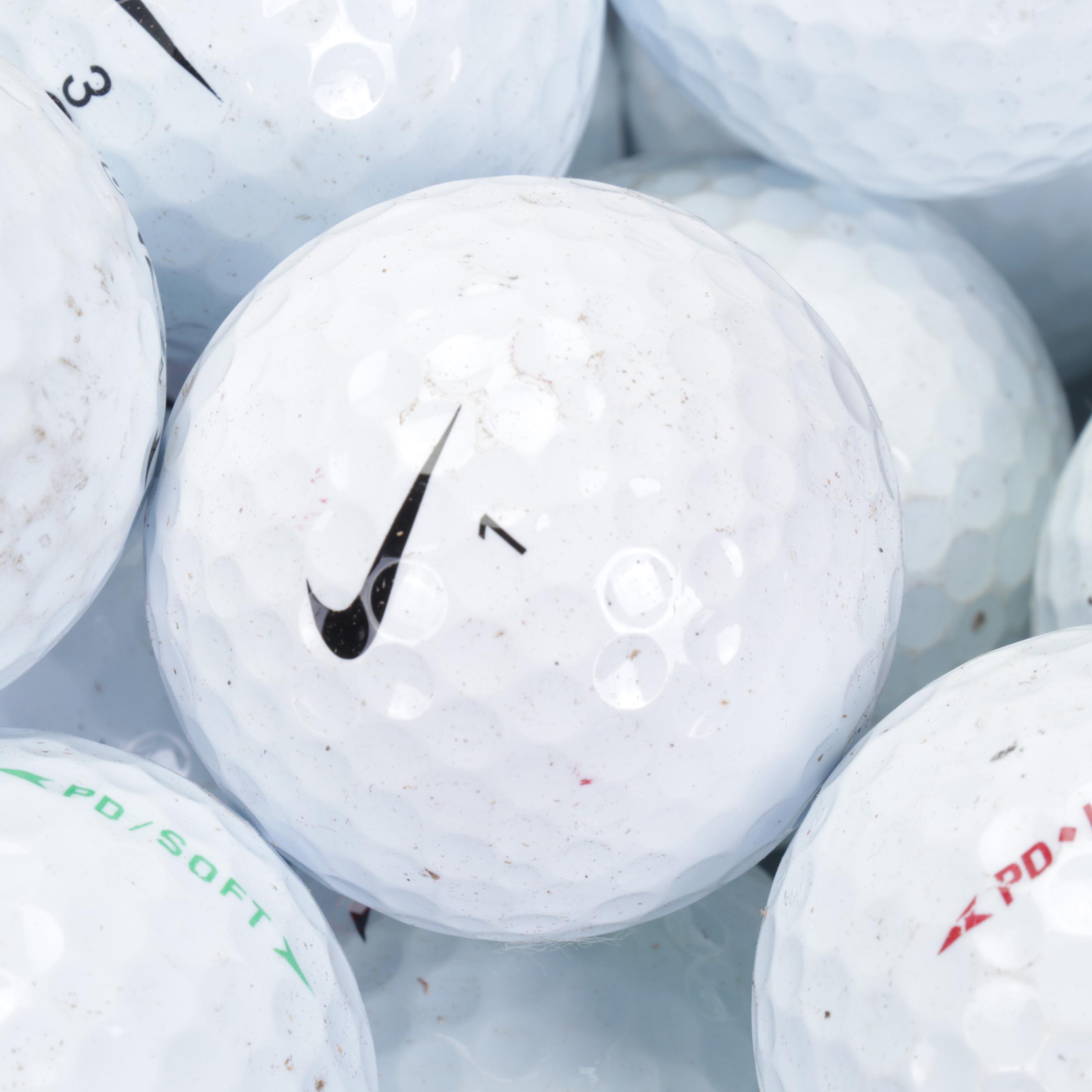 One Hundred Golf Balls Including Nike and More