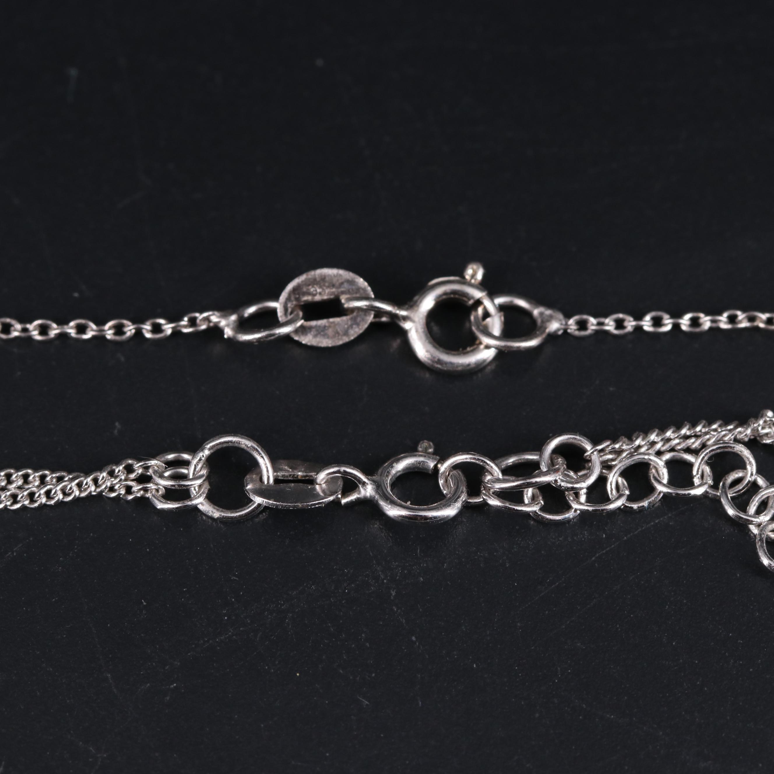 Sterling Silver Pendant and Bracelet Including Gemstones