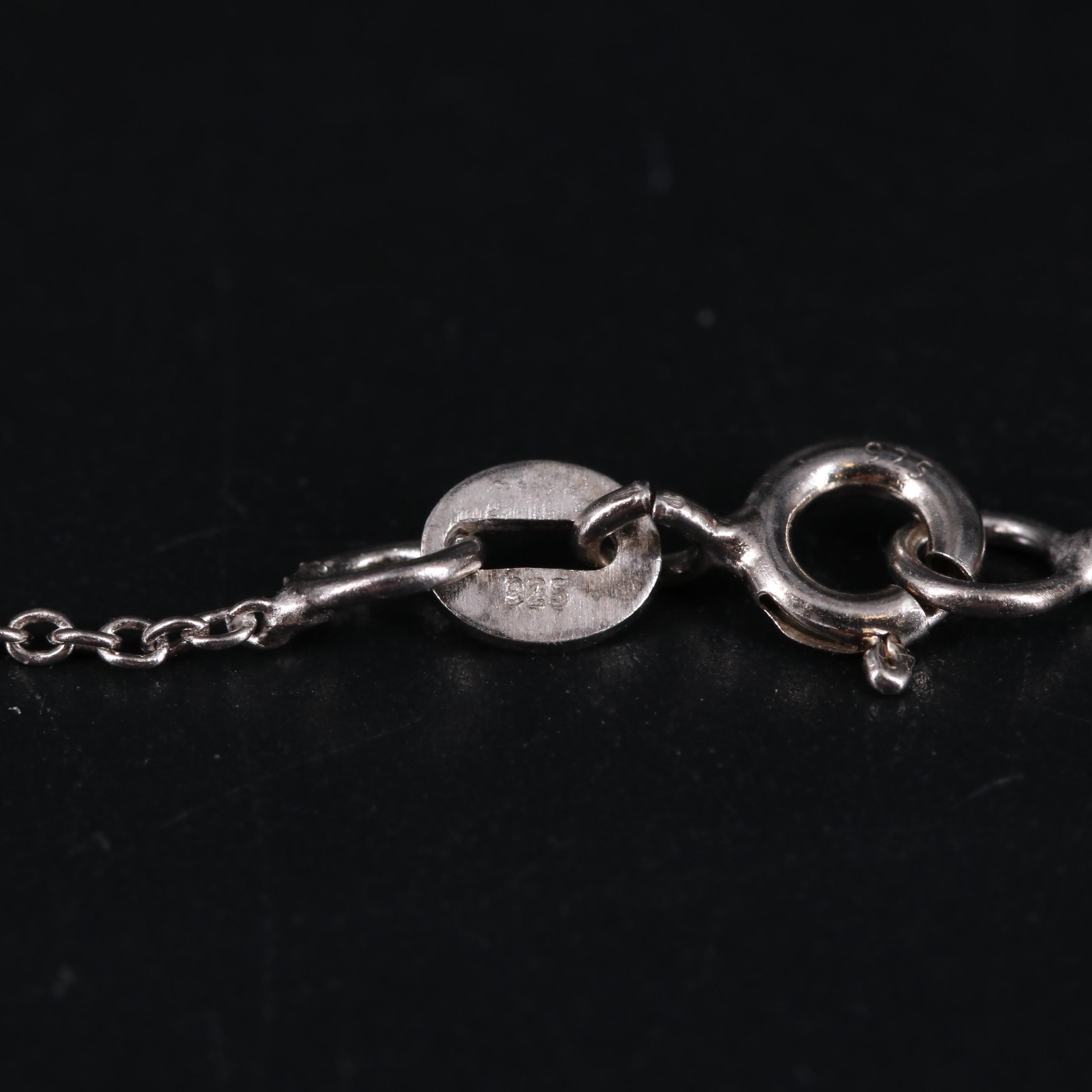 Sterling Silver Pendant and Bracelet Including Gemstones