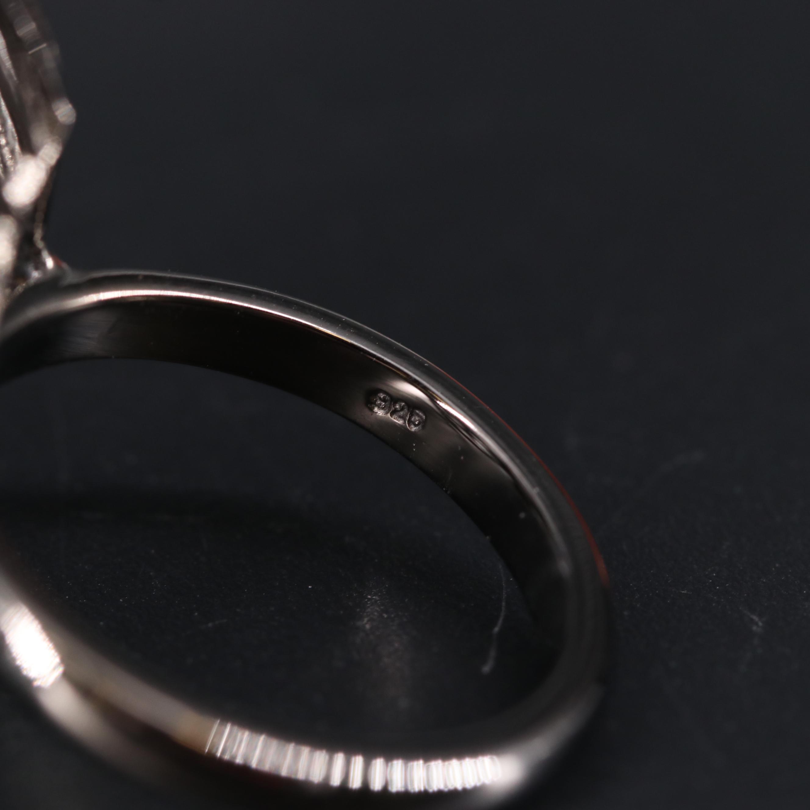 Sterling Silver Abstract Ring with Raised Cage Setting Including Gemstones