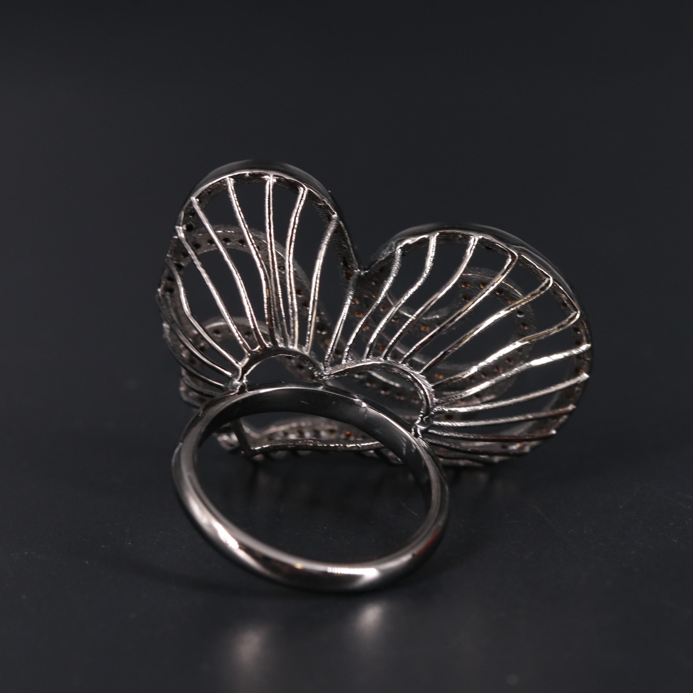 Sterling Silver Abstract Ring with Raised Cage Setting Including Gemstones