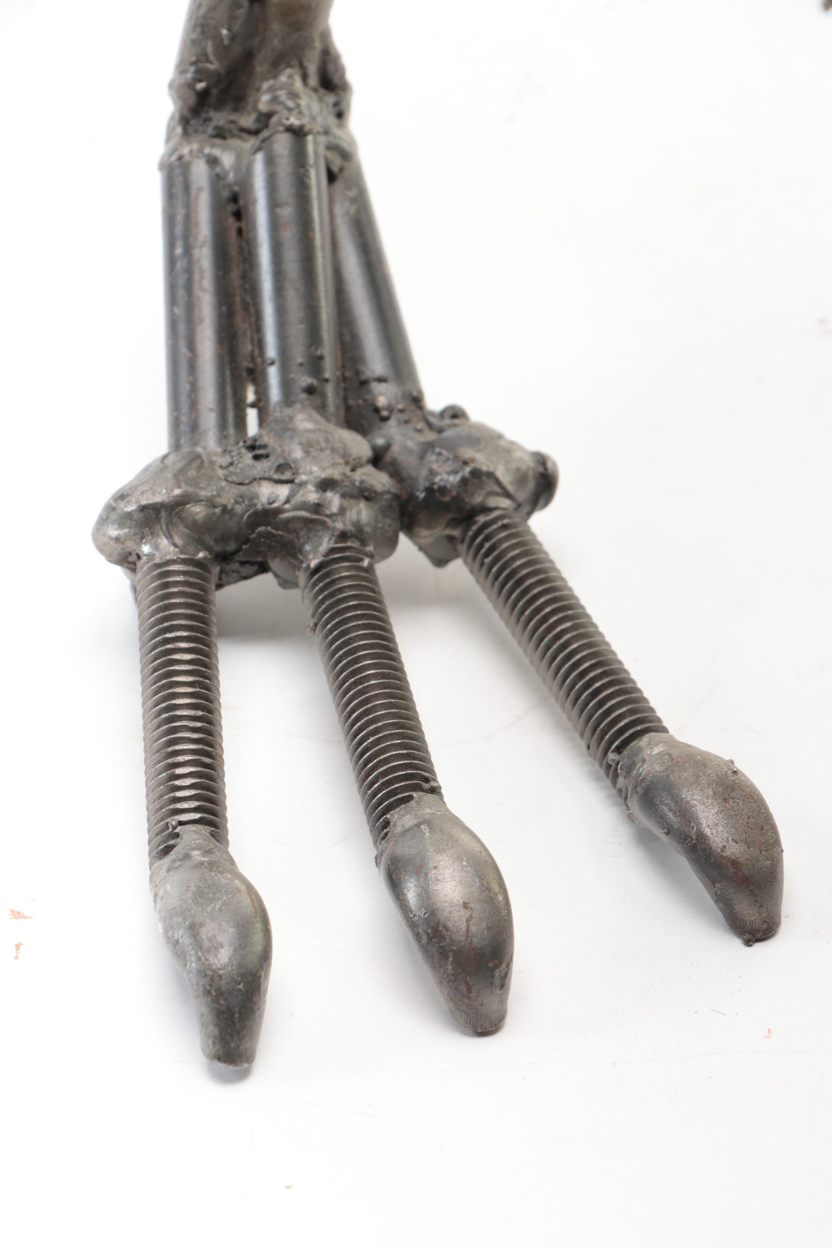 Metal Park Scrap Metal Sculpture of Predatory Dinosaur Skeleton