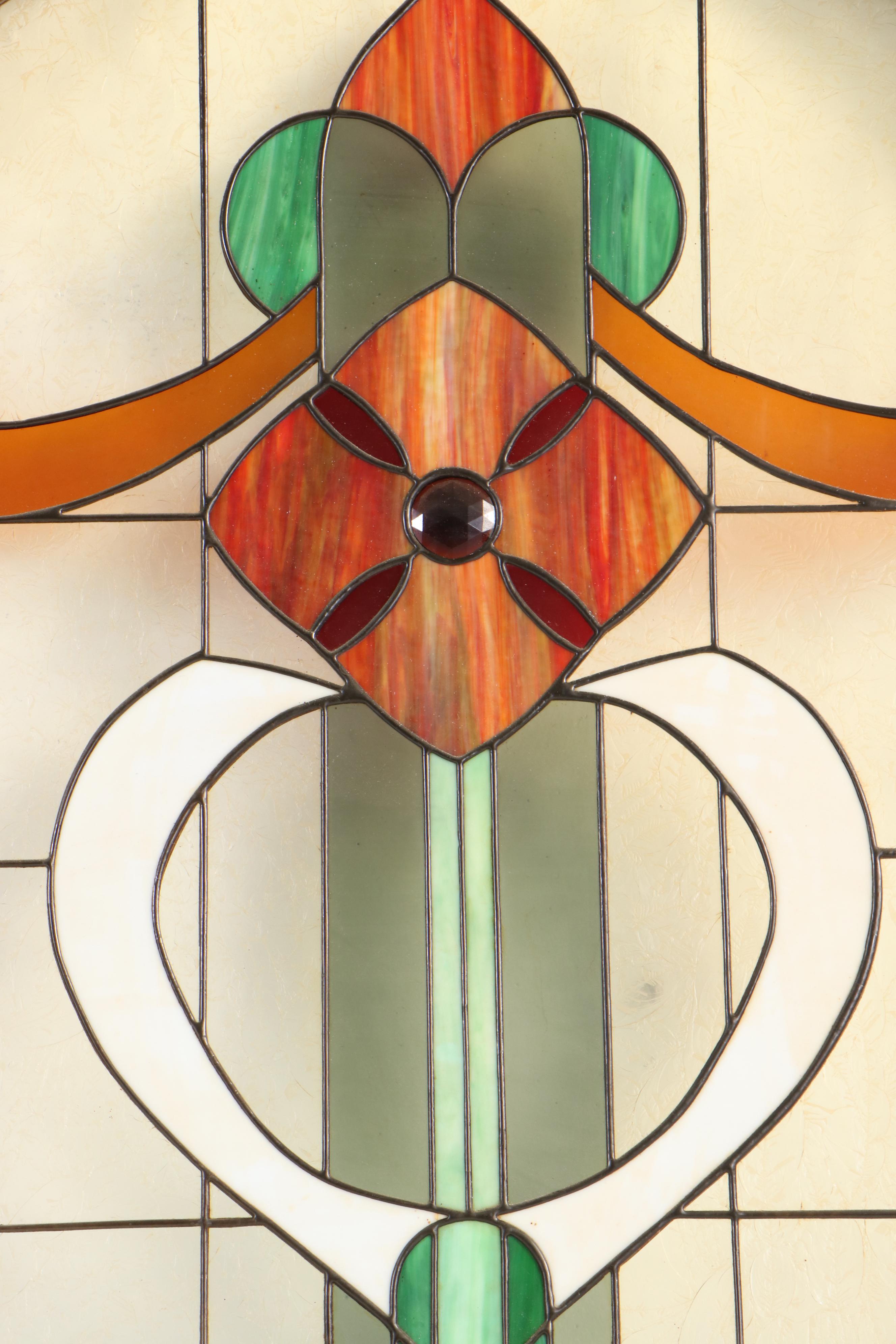 Pair of Fir Pocket Doors with Arched Leaded Stained and Slag Glass Windows