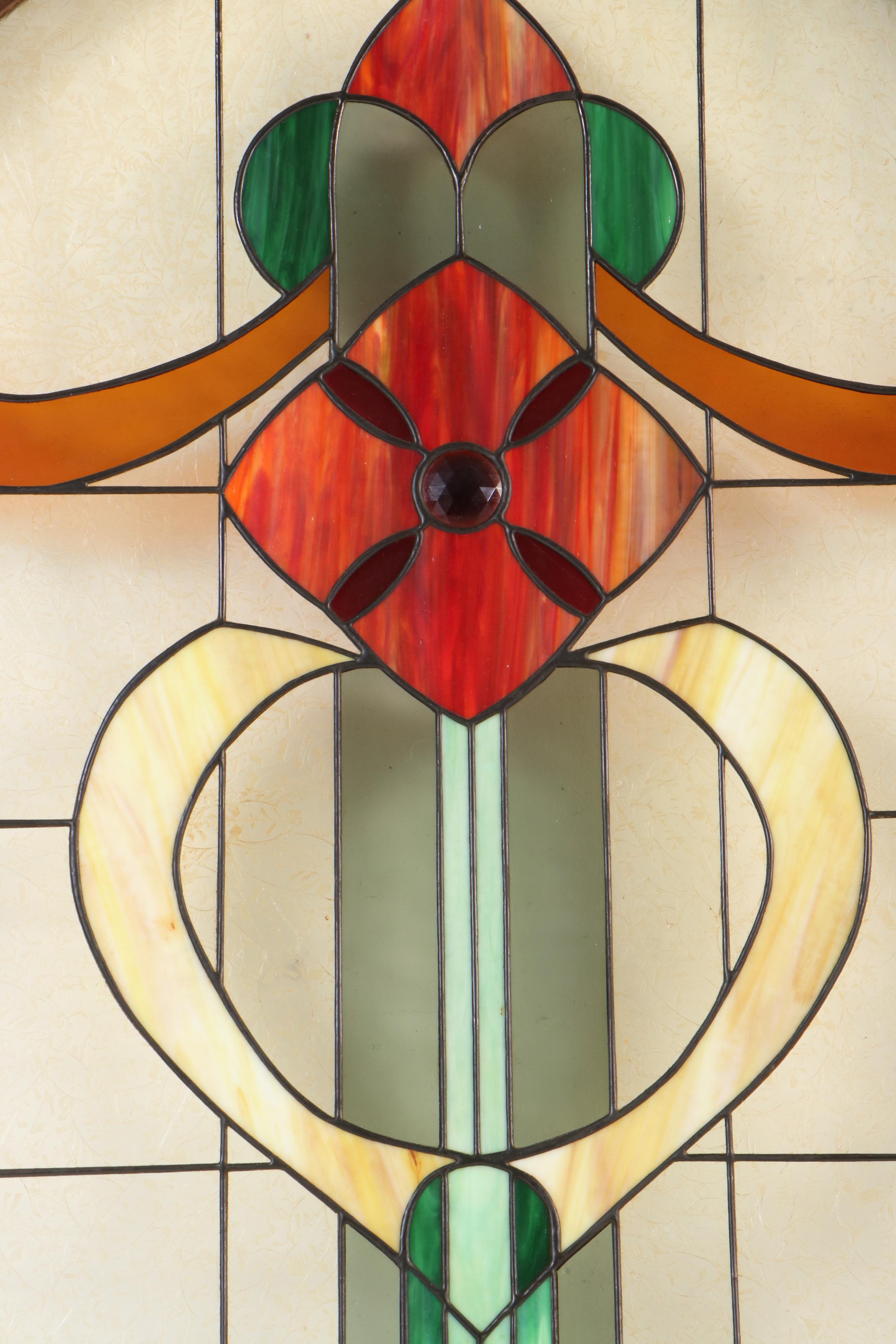 Pair of Fir Pocket Doors with Arched Leaded Stained and Slag Glass Windows