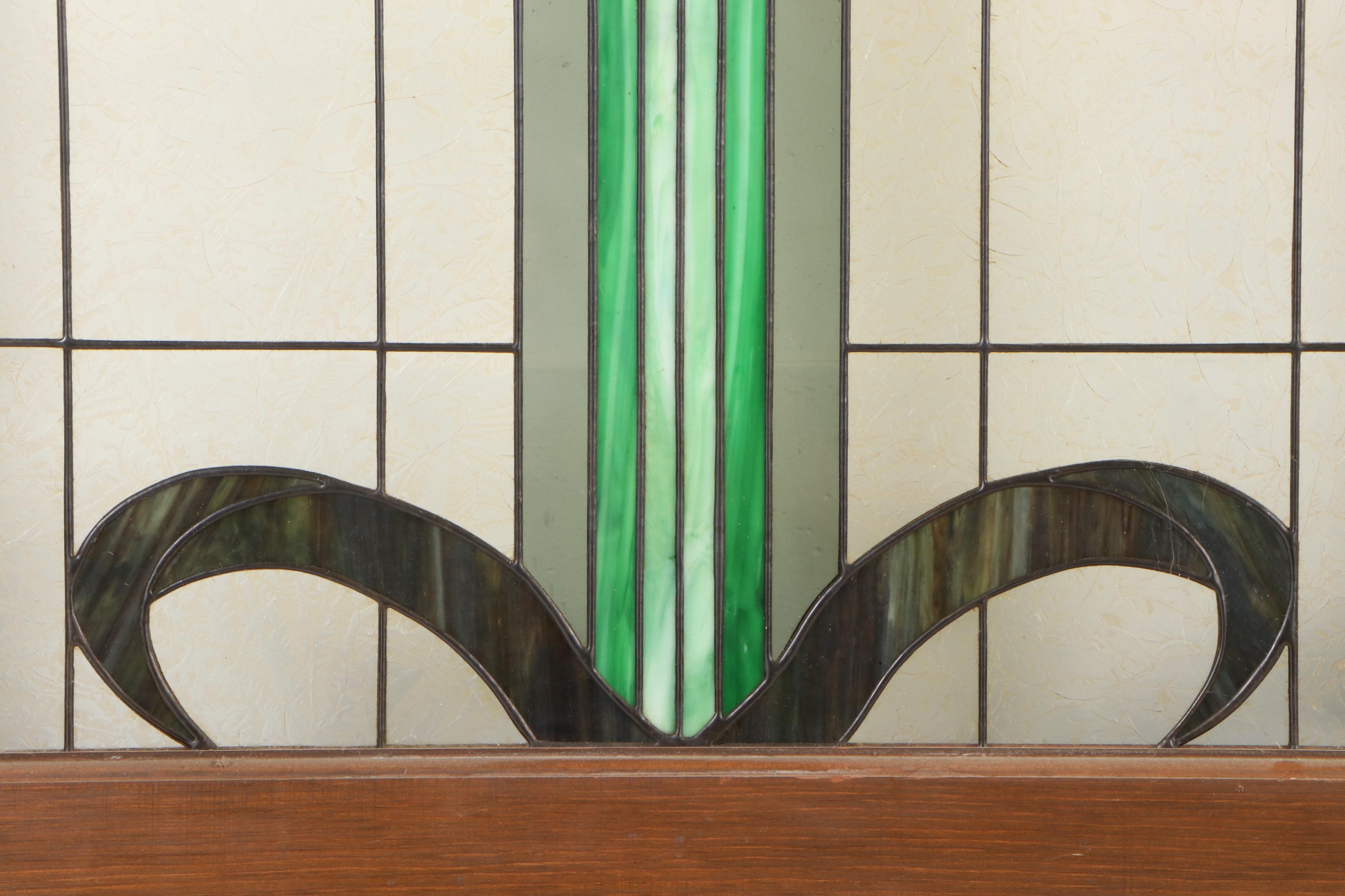 Pair of Fir Pocket Doors with Arched Leaded Stained and Slag Glass Windows