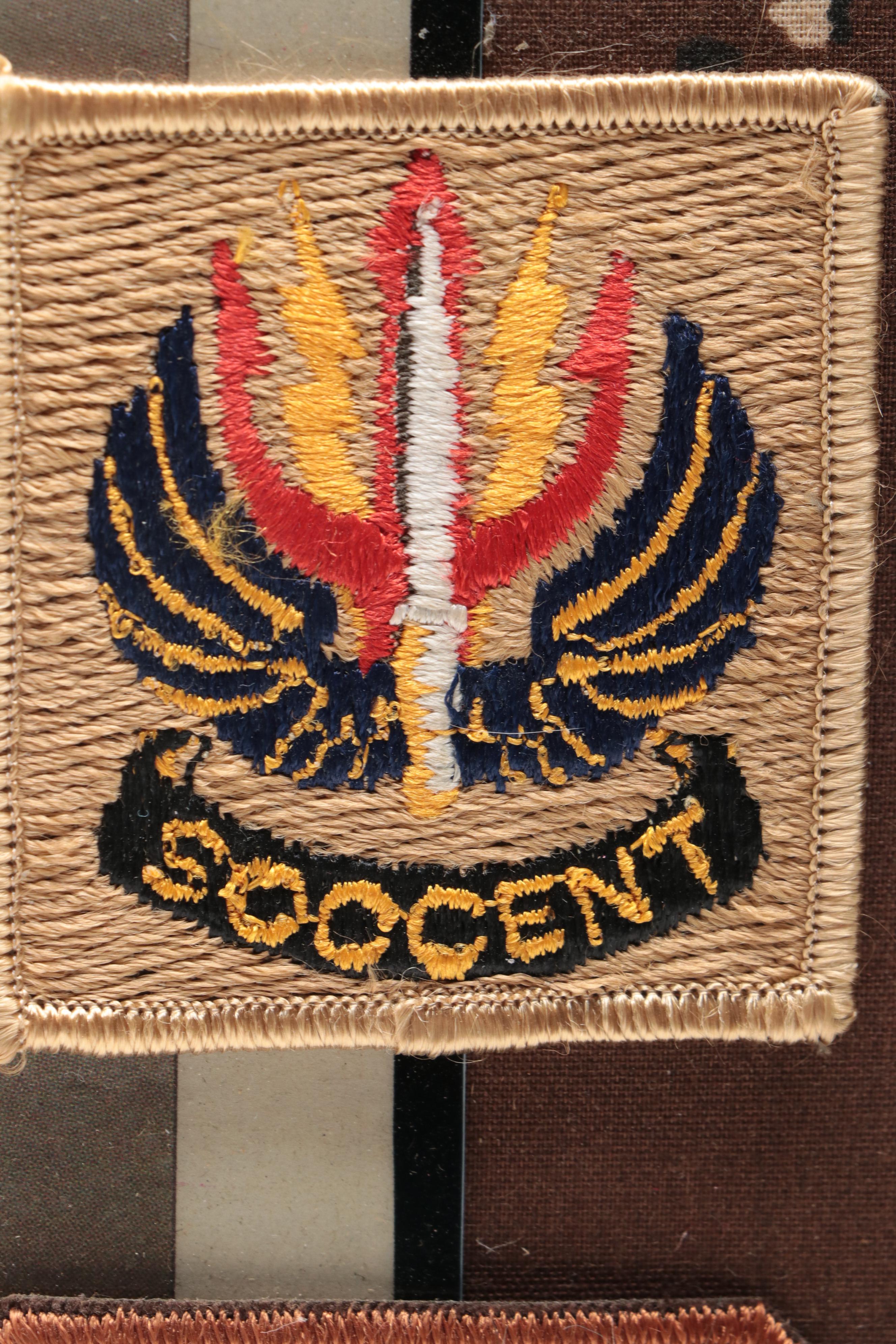 U. S. Military Gulf War Memorabilia Including Patches, Pins and Newspaper Cover