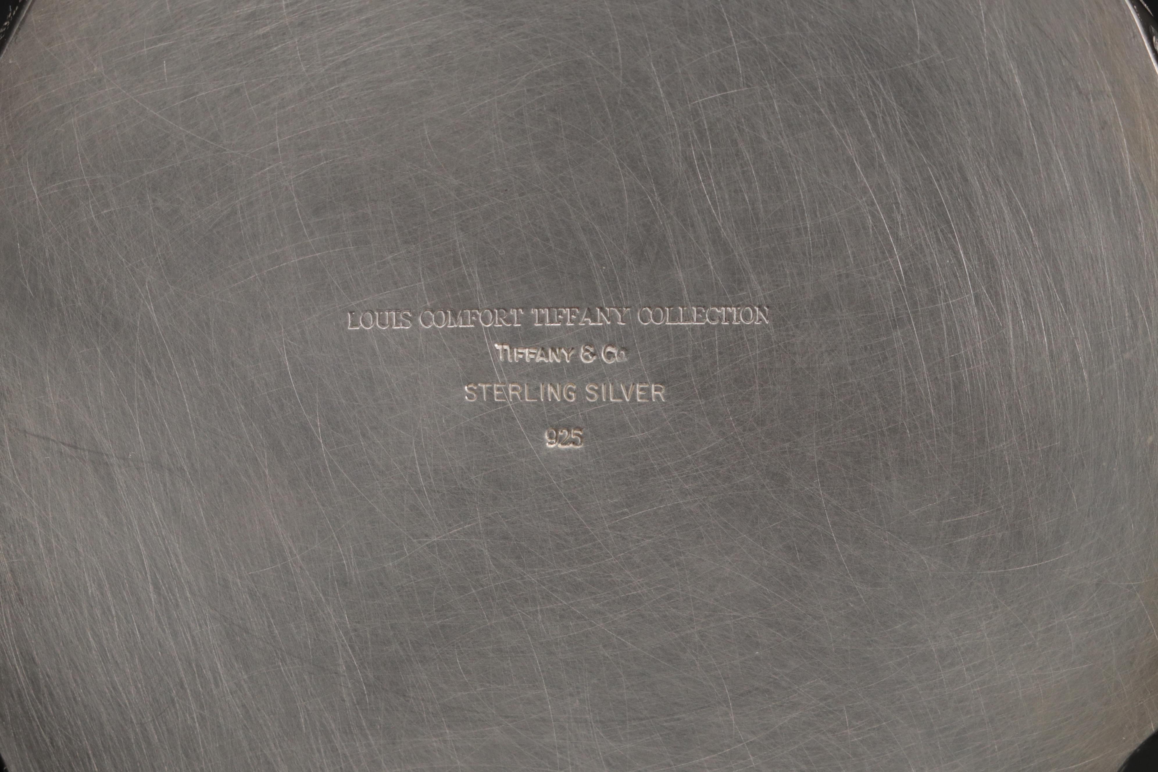 Tiffany & Co. Louis Comfort Tiffany Collection Silver Candlesticks and Coasters