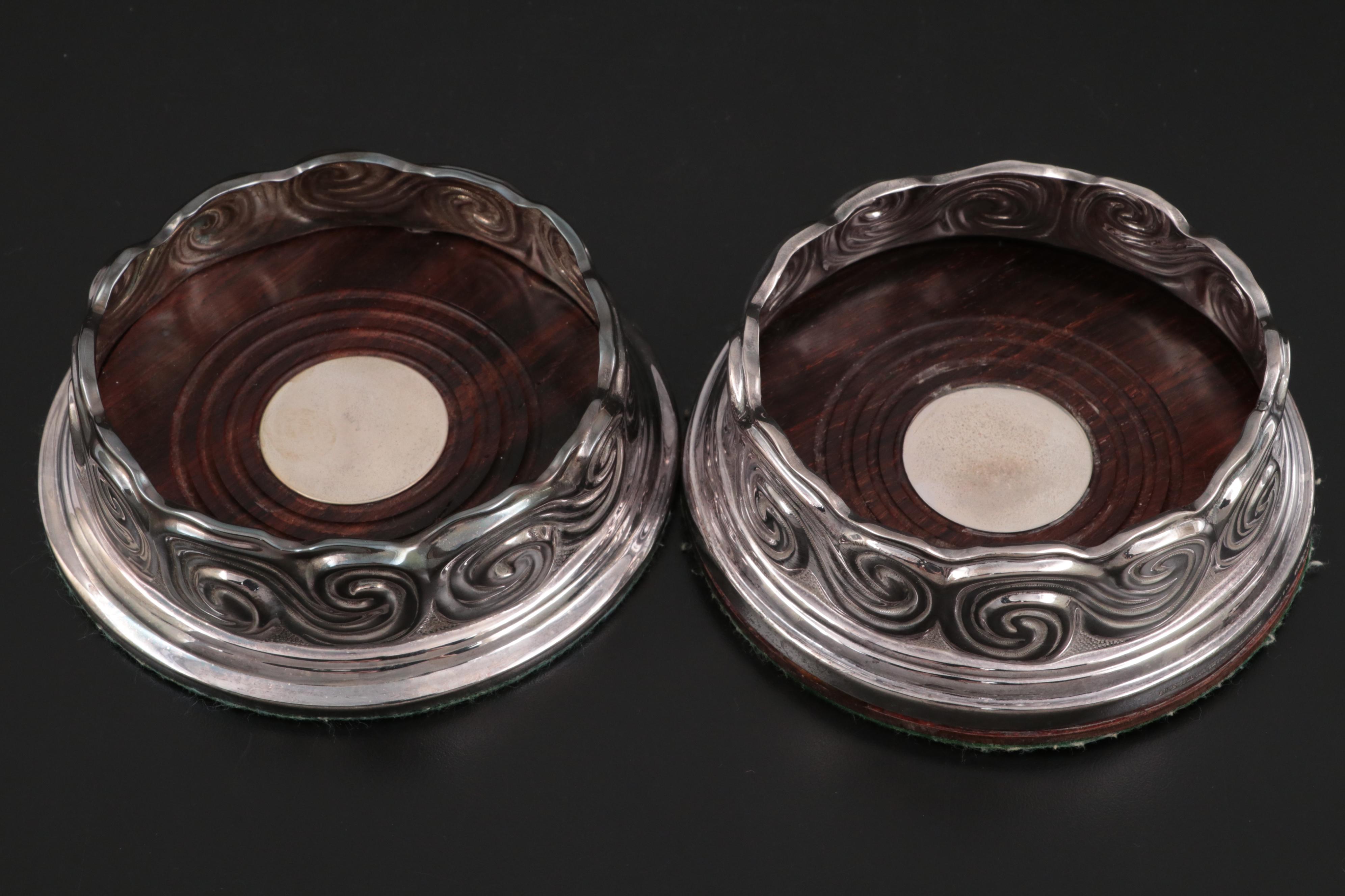 Tiffany & Co. Louis Comfort Tiffany Collection Silver Candlesticks and Coasters