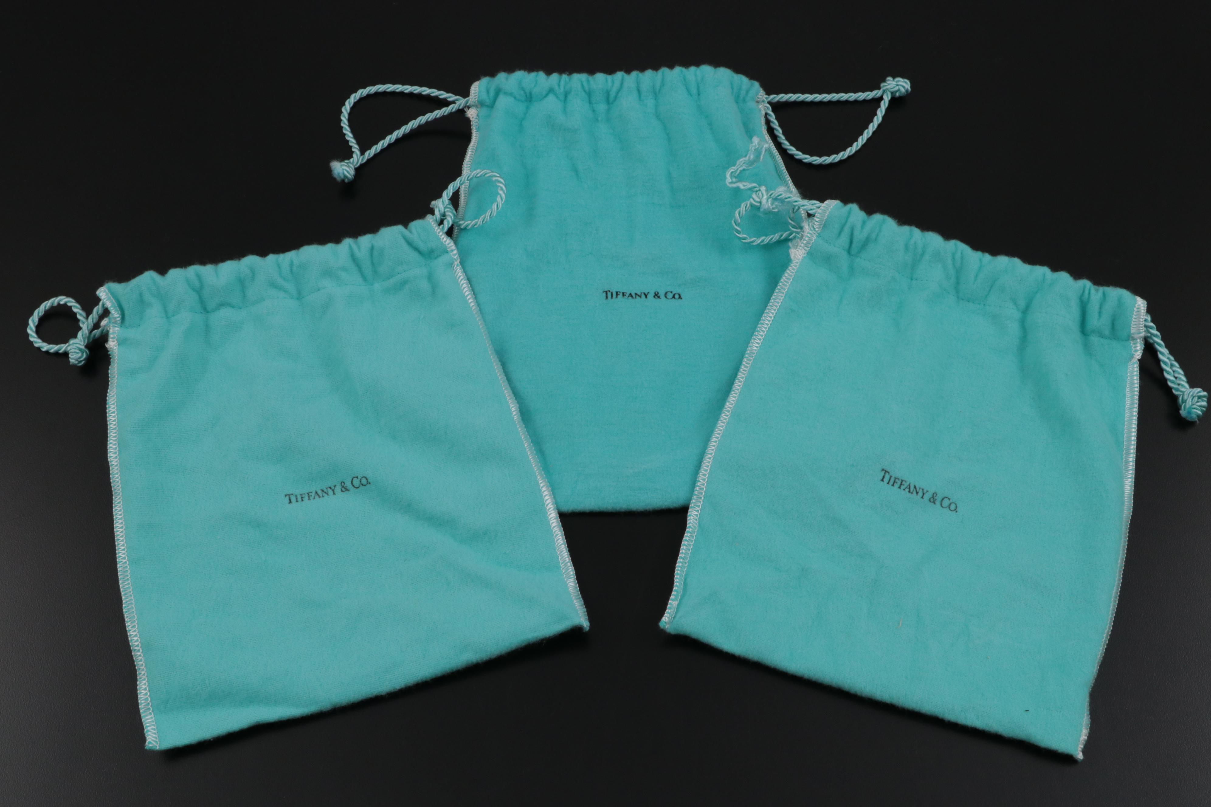 Tiffany & Co. Louis Comfort Tiffany Collection Silver Candlesticks and Coasters