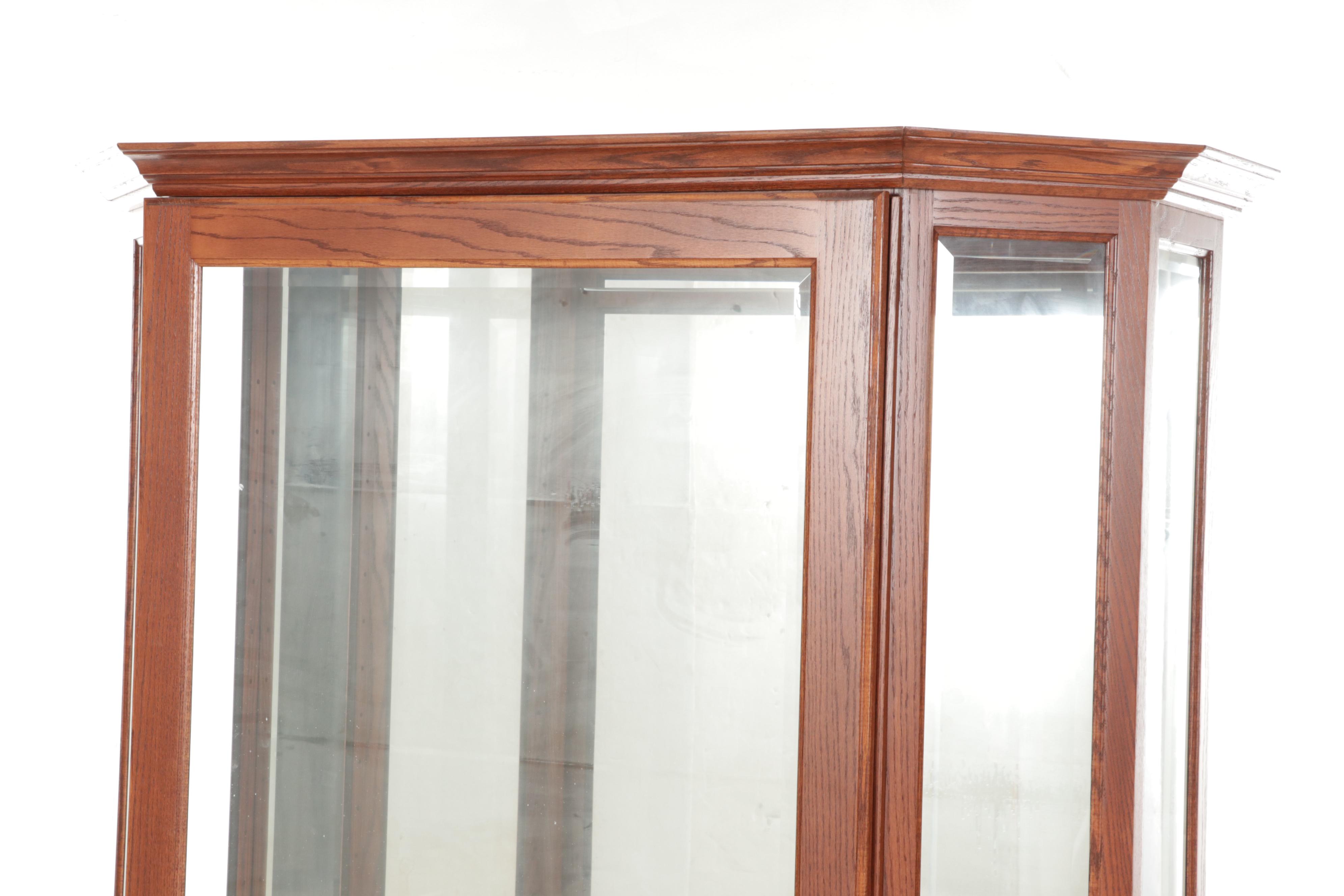 Illuminated Beveled Glass Sliding Door Curio Cabinet