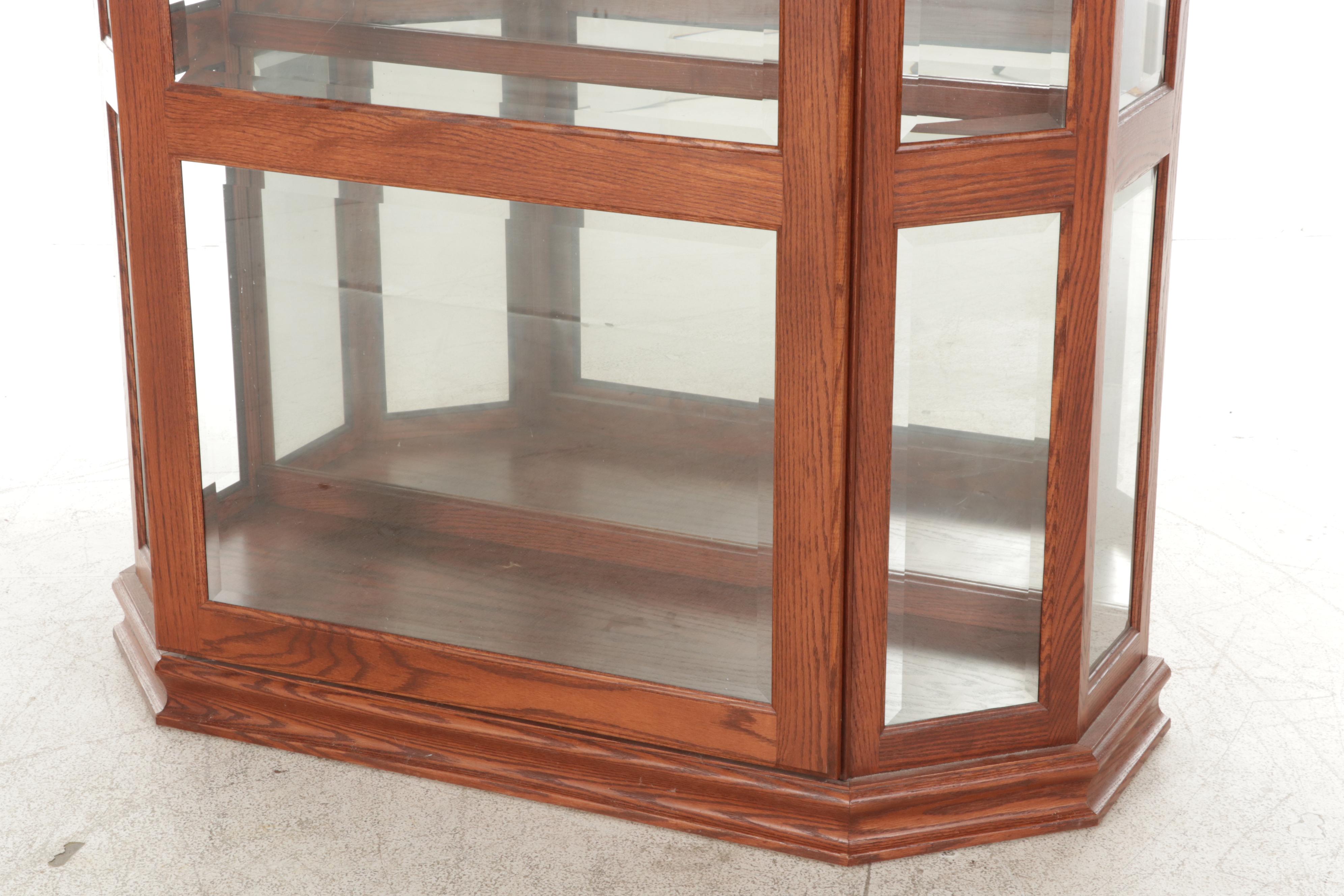 Illuminated Beveled Glass Sliding Door Curio Cabinet