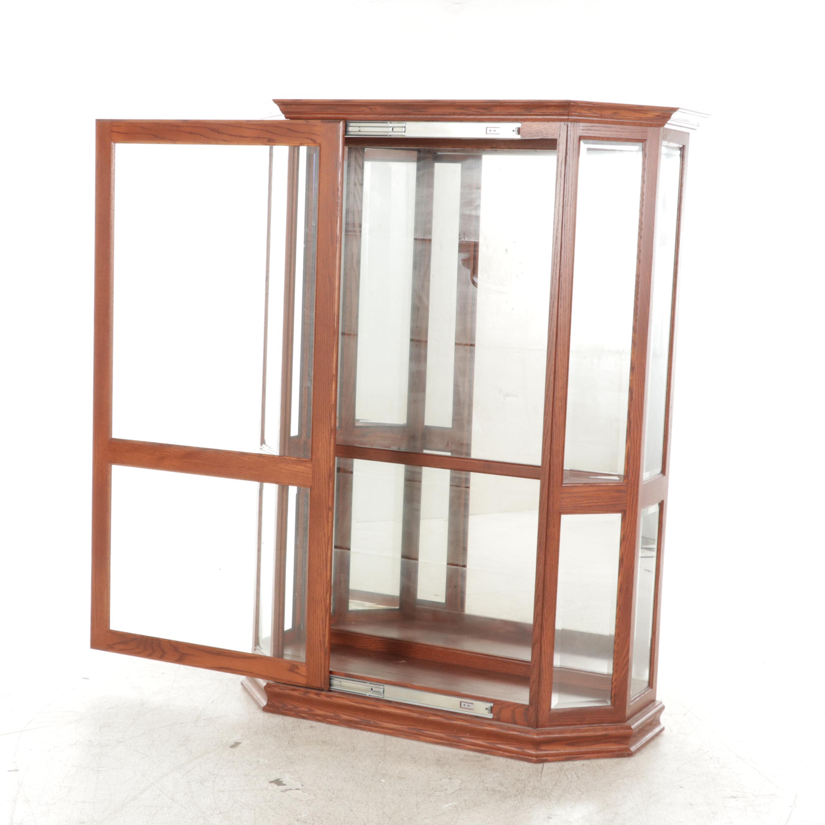 Illuminated Beveled Glass Sliding Door Curio Cabinet