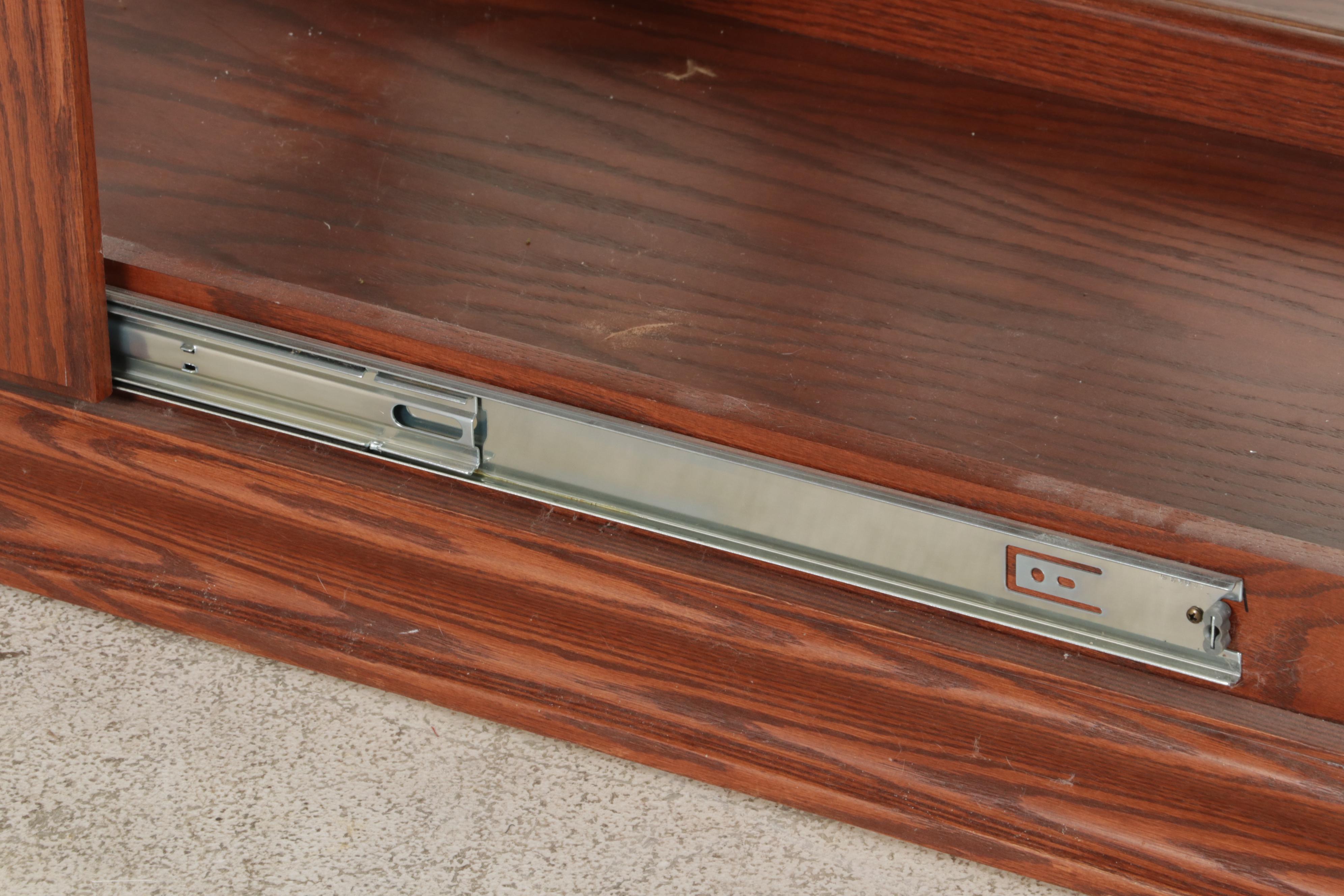 Illuminated Beveled Glass Sliding Door Curio Cabinet