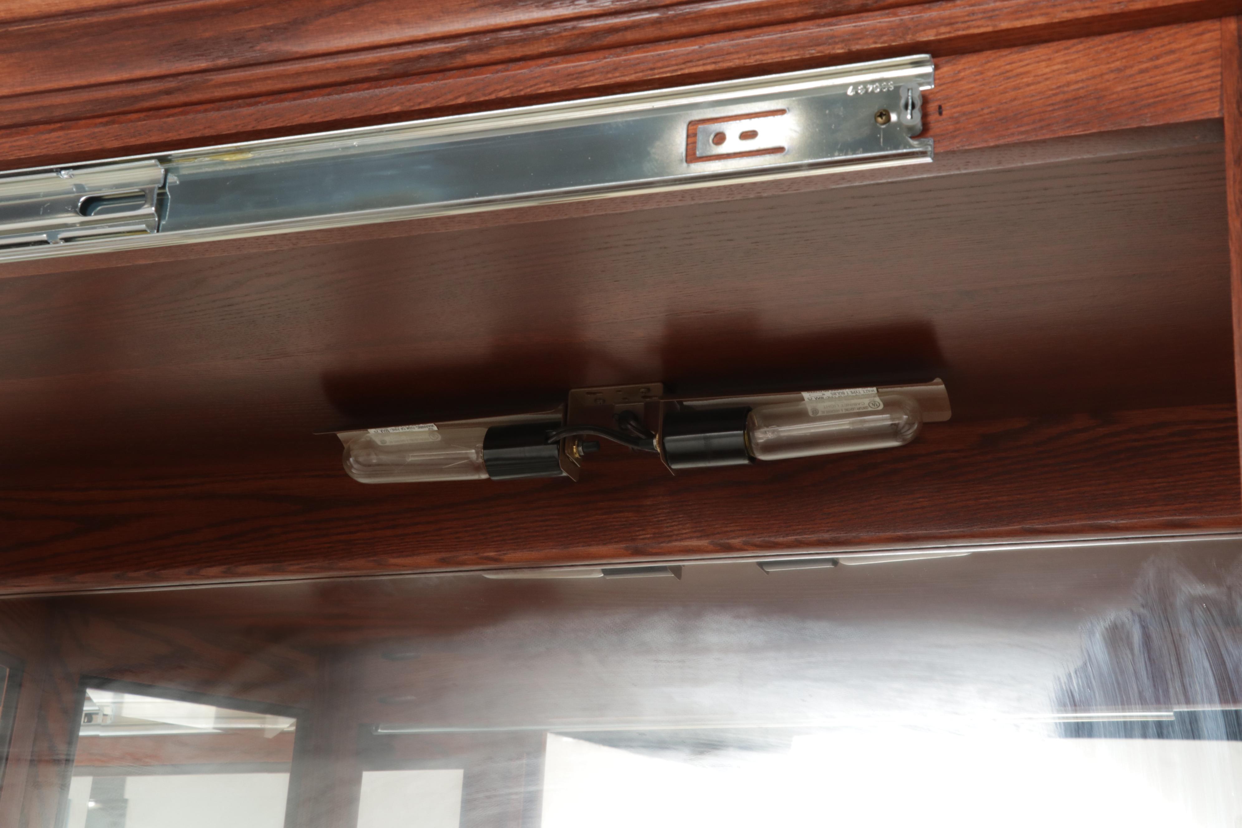 Illuminated Beveled Glass Sliding Door Curio Cabinet