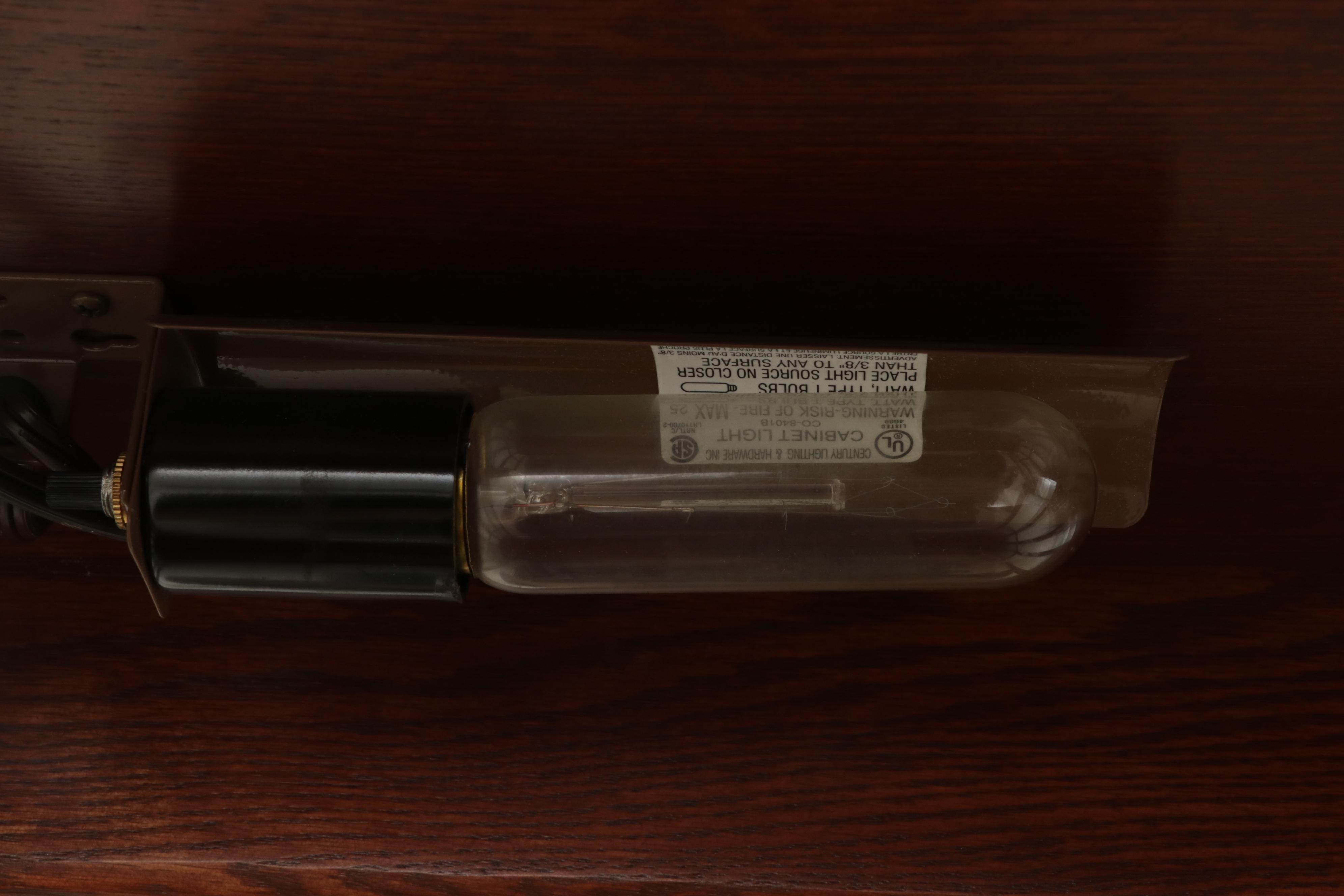 Illuminated Beveled Glass Sliding Door Curio Cabinet