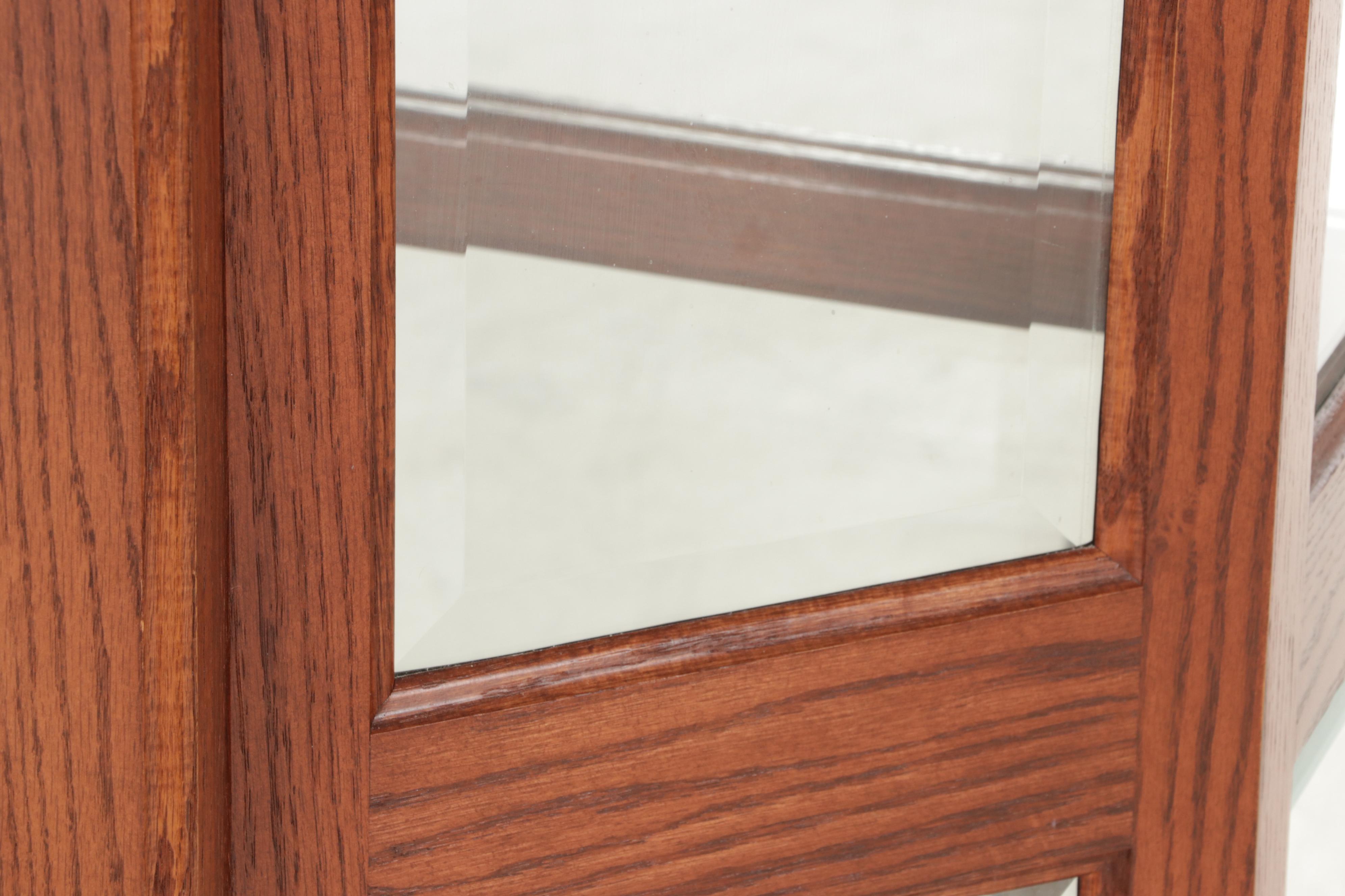 Illuminated Beveled Glass Sliding Door Curio Cabinet