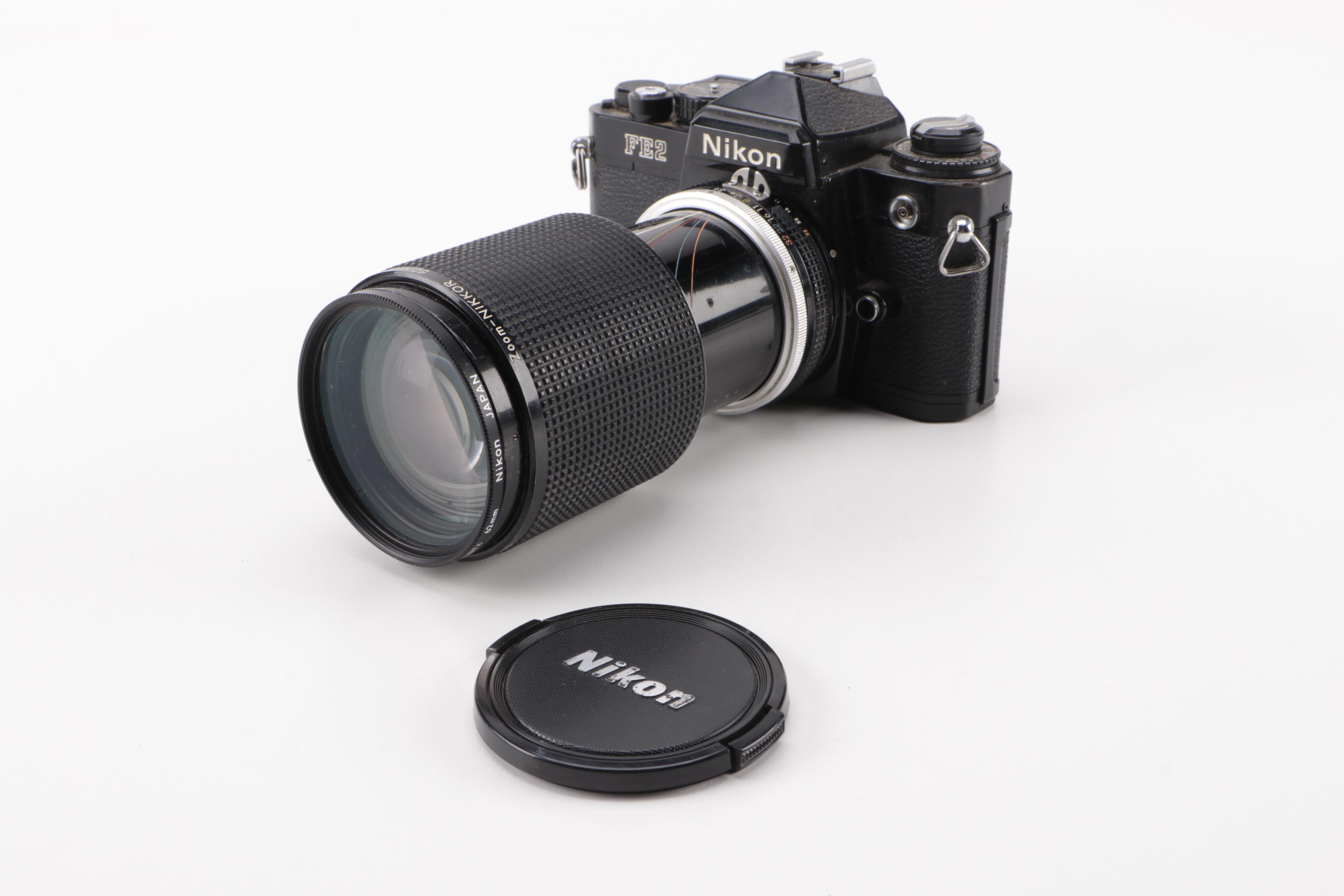 Nikon FE2 35mm SLR Camera with Lenses, Caps and Filters