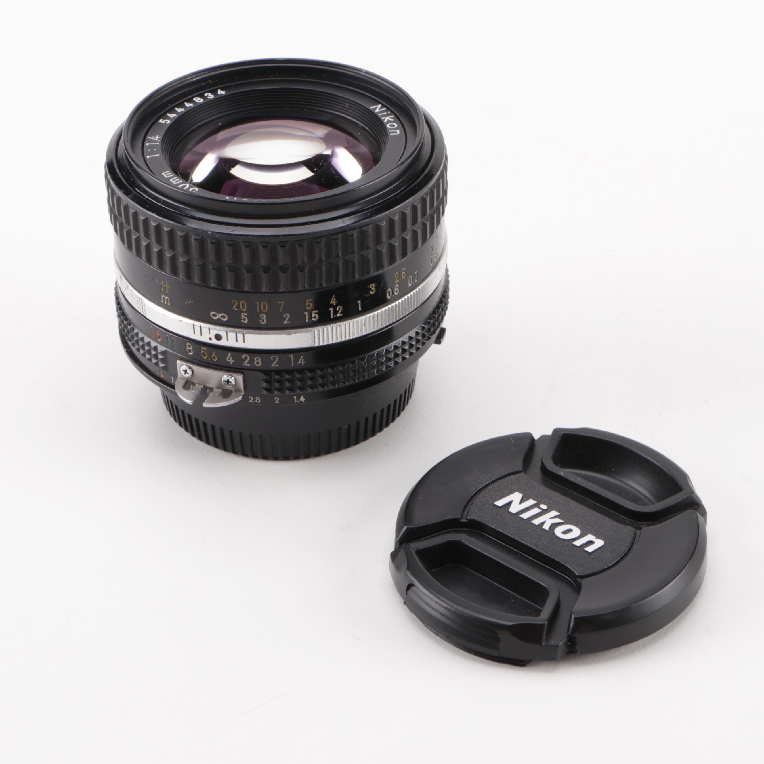 Nikon FE2 35mm SLR Camera with Lenses, Caps and Filters