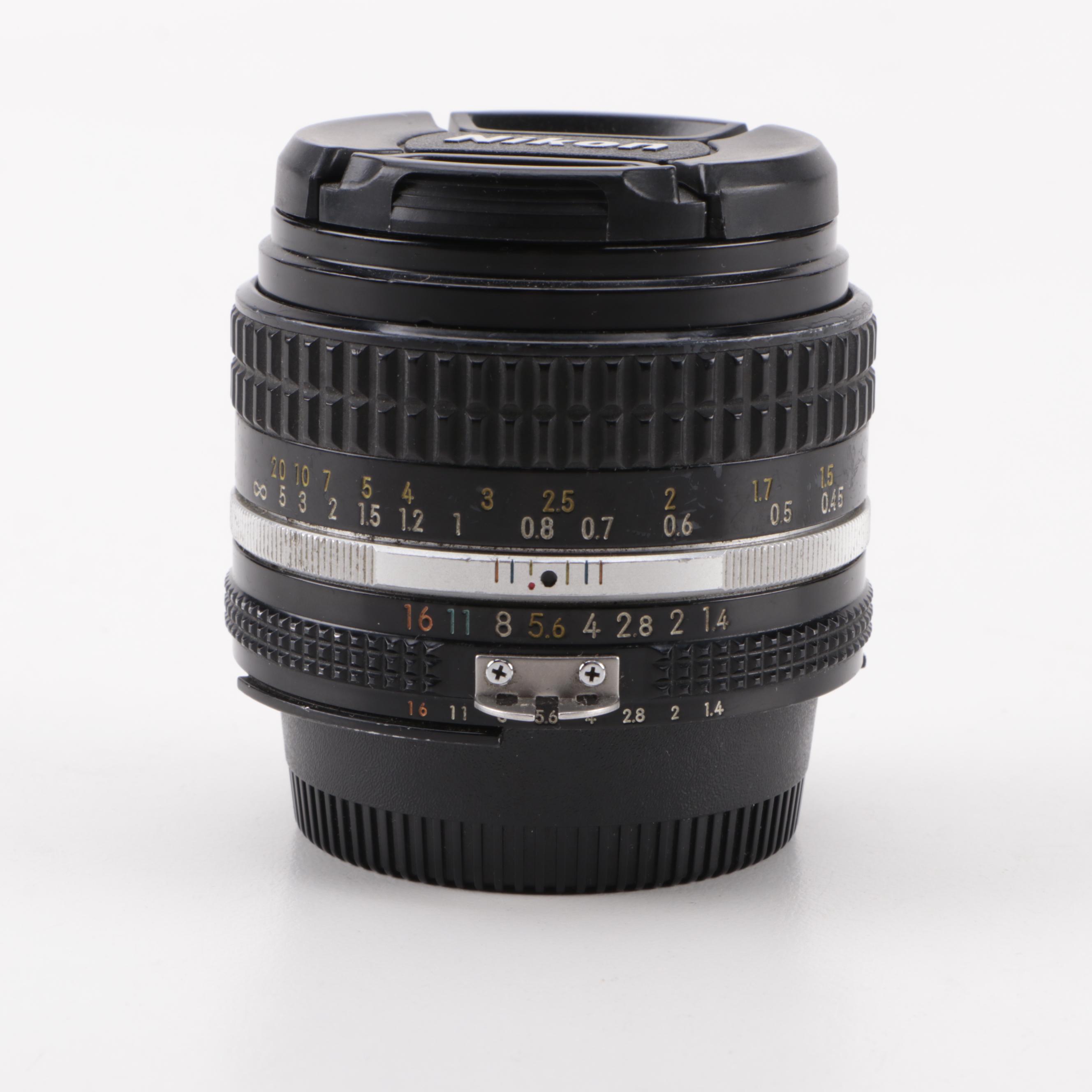 Nikon FE2 35mm SLR Camera with Lenses, Caps and Filters