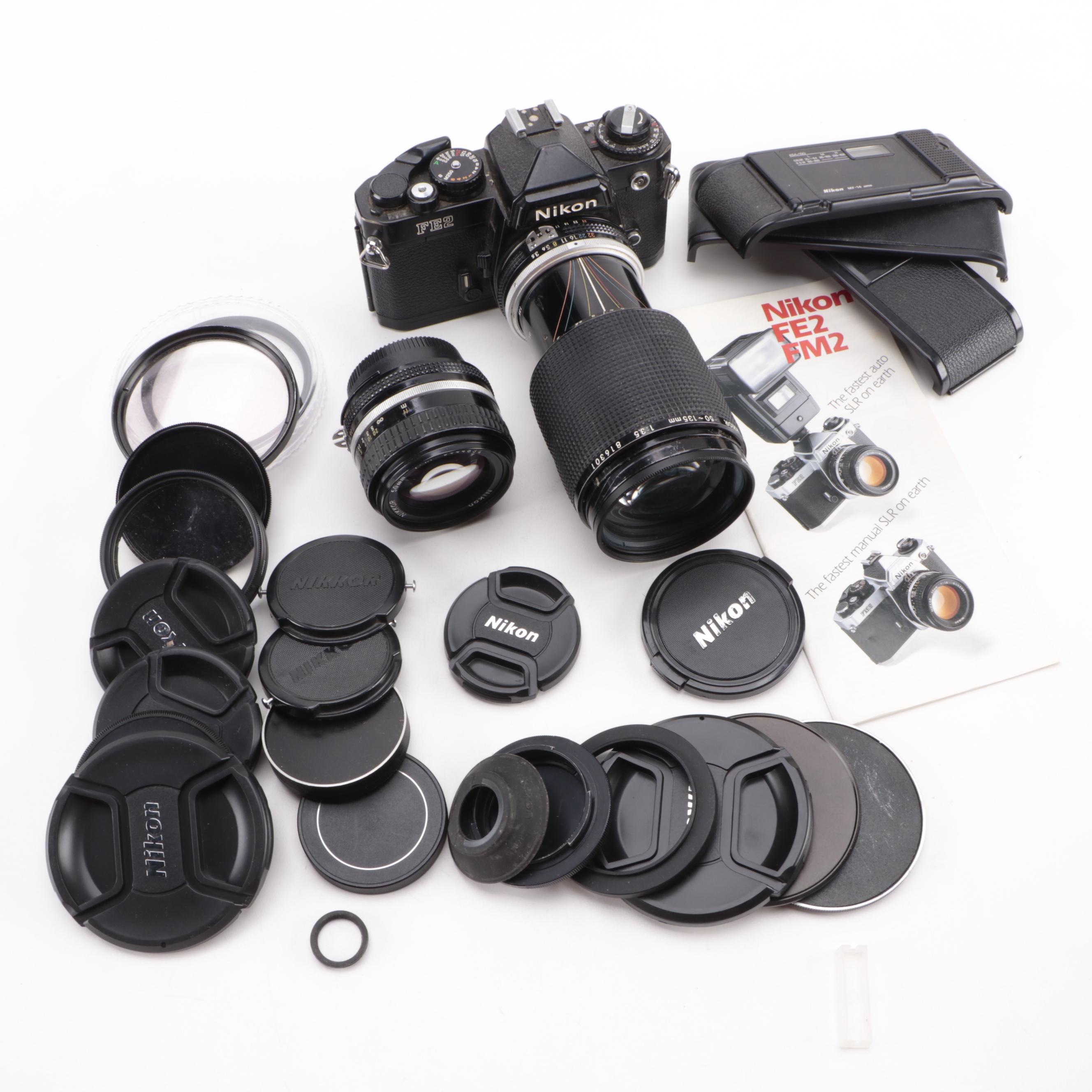 Nikon FE2 35mm SLR Camera with Lenses, Caps and Filters