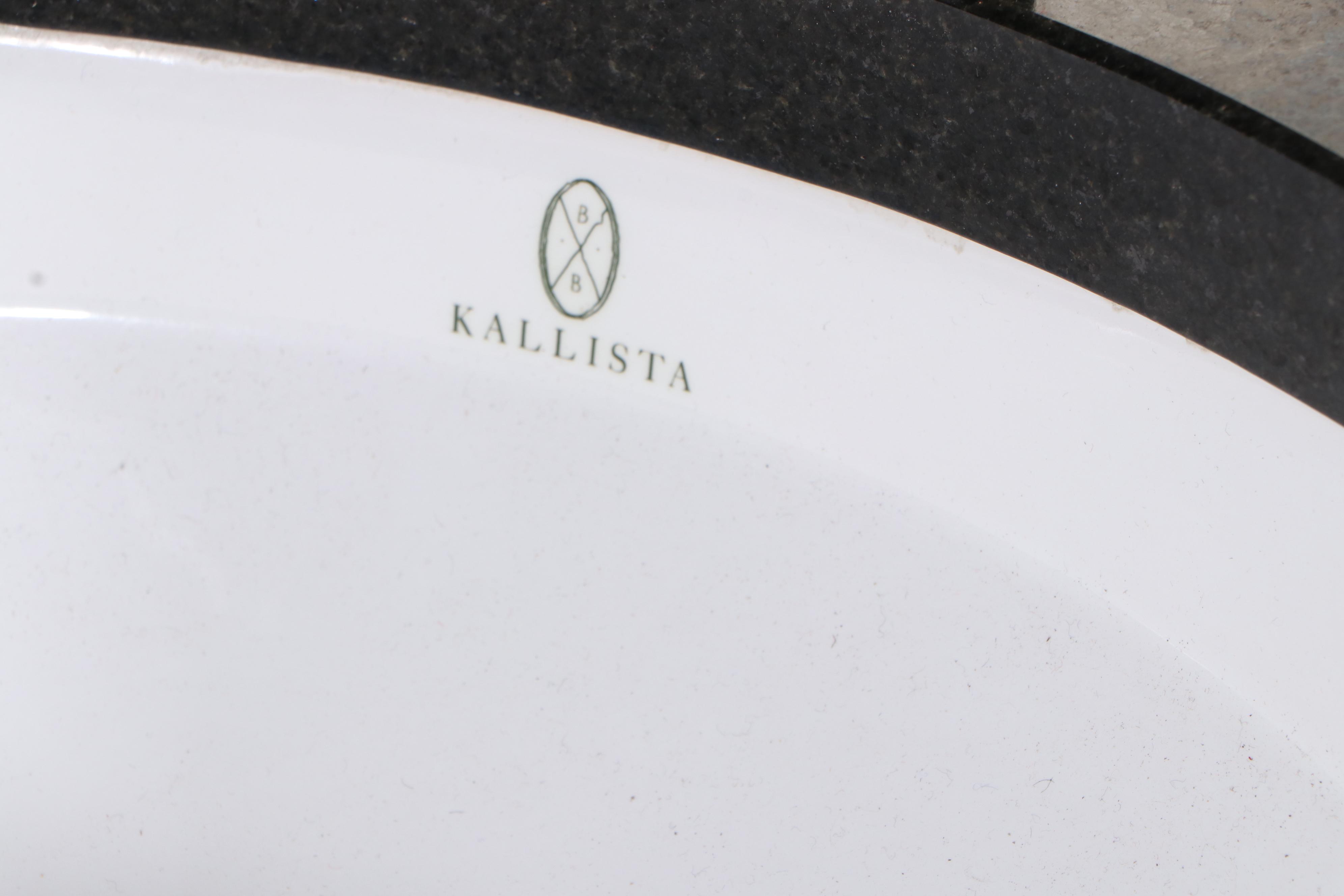 Beveled Mirrored Bathroom Vanity with Kallista Sink and Black Granite Top