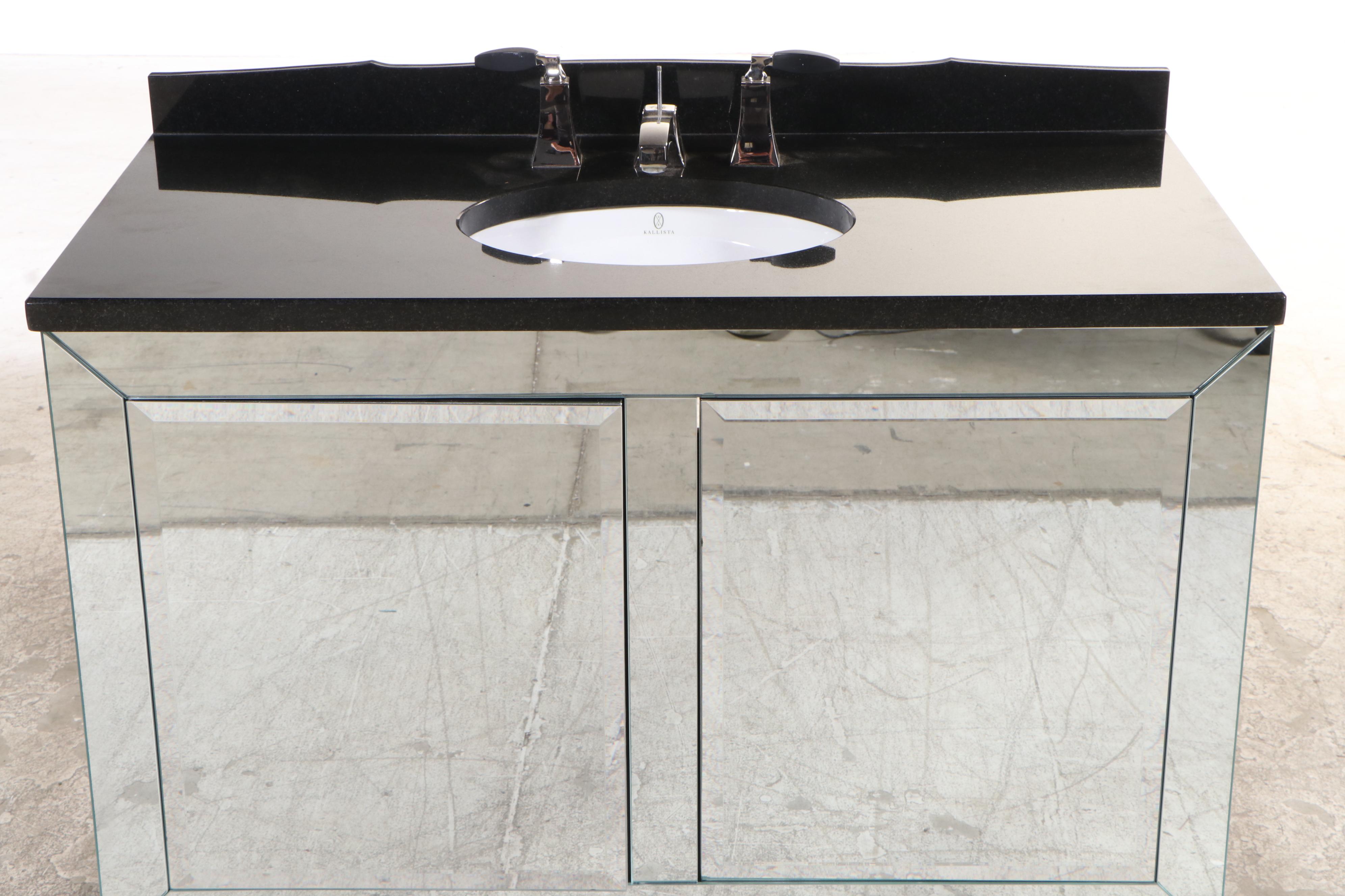 Beveled Mirrored Bathroom Vanity with Kallista Sink and Black Granite Top