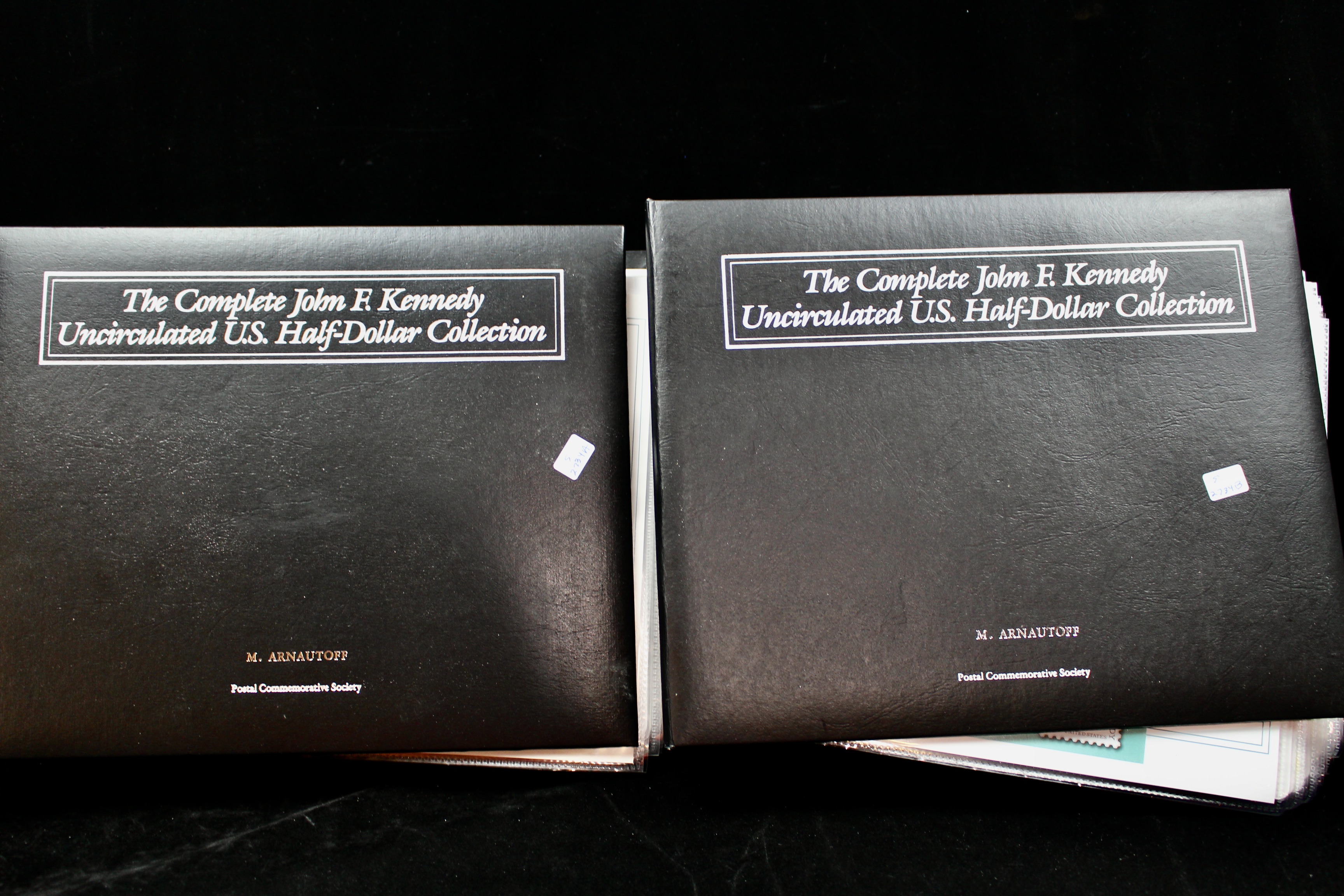 Complete Two Volume John F. Kennedy Uncirculated U.S. Half Dollar Collection