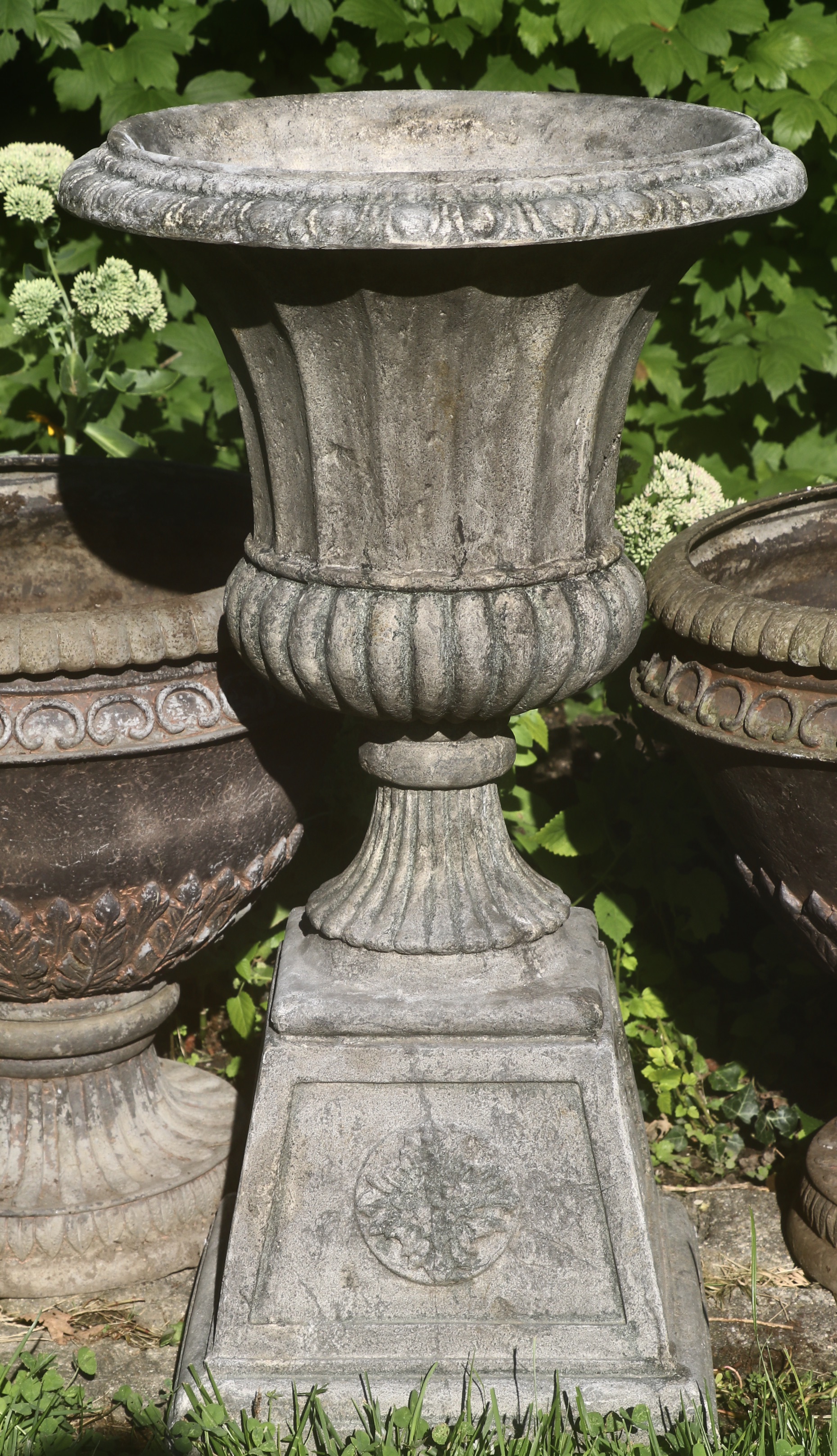 Collection of Fiberglass Urn-Shaped Planters