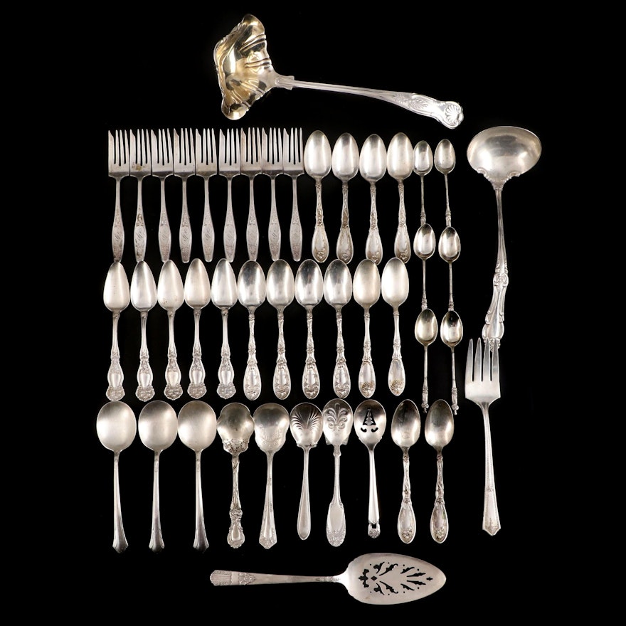 Silver Plate Utensils Including a William Rogers Punch Ladle and Apostle Spoons