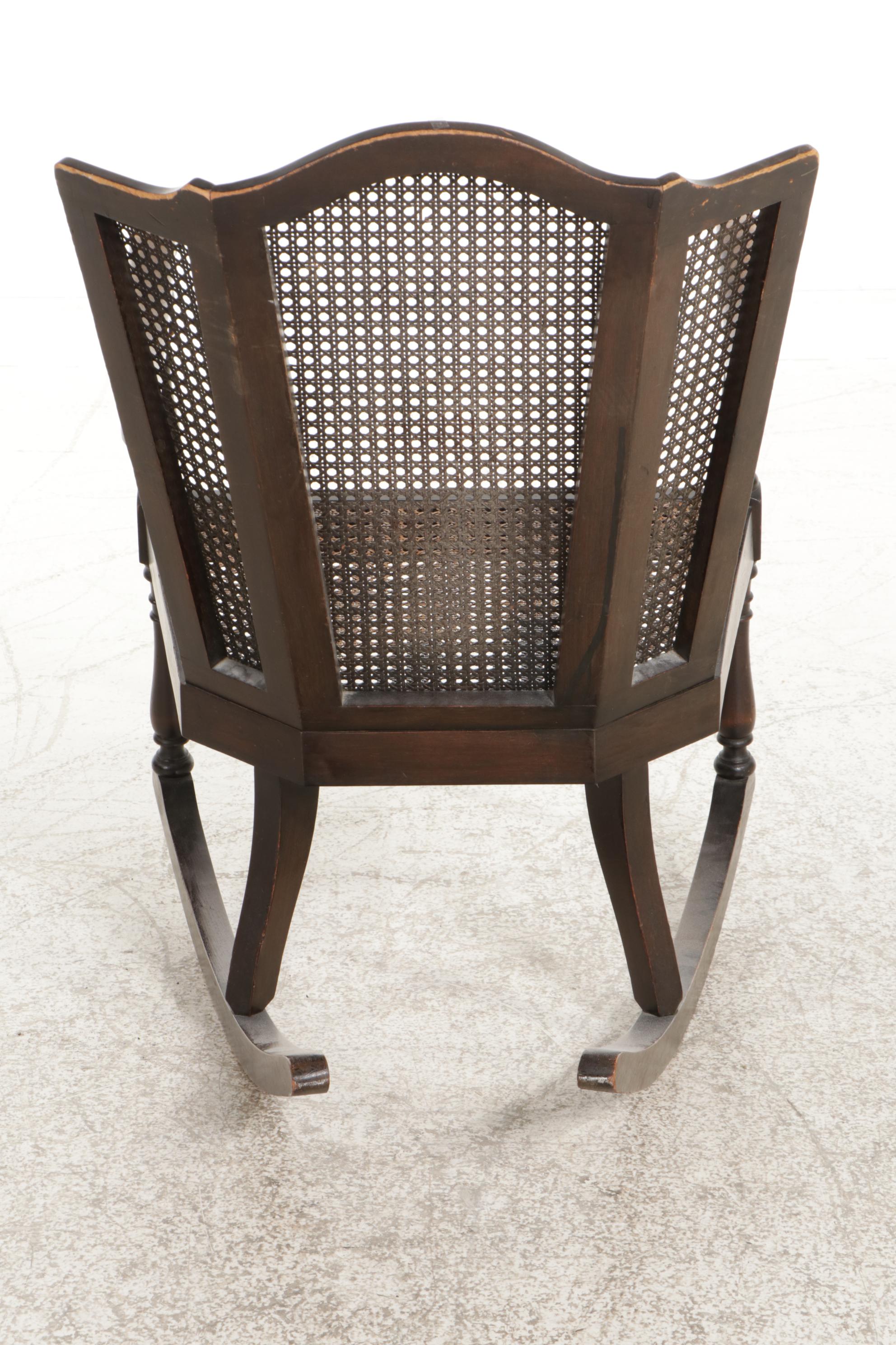 Queen Anne Style Ebonized and Caned Wingback Rocking Armchair