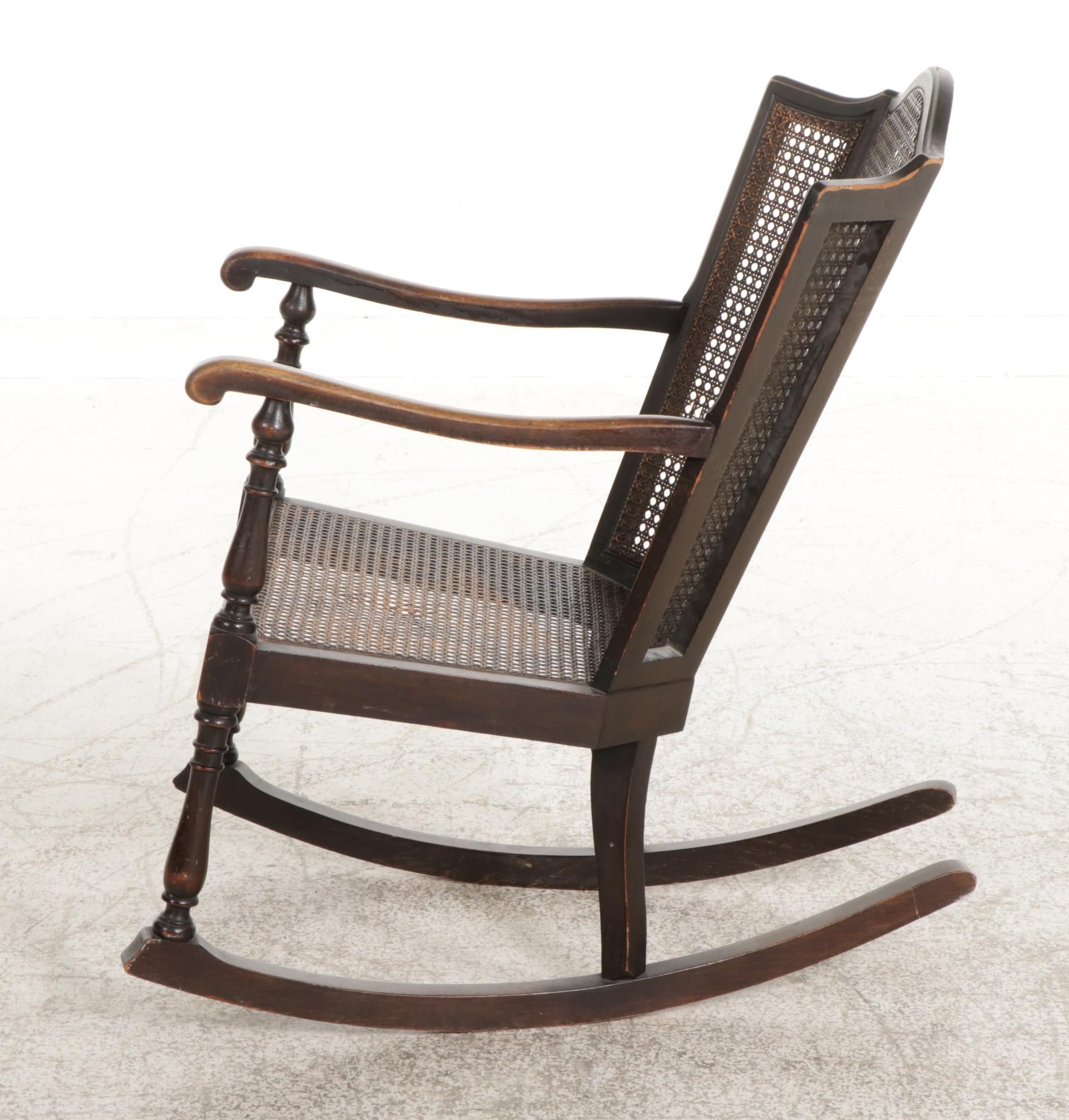 Queen Anne Style Ebonized and Caned Wingback Rocking Armchair