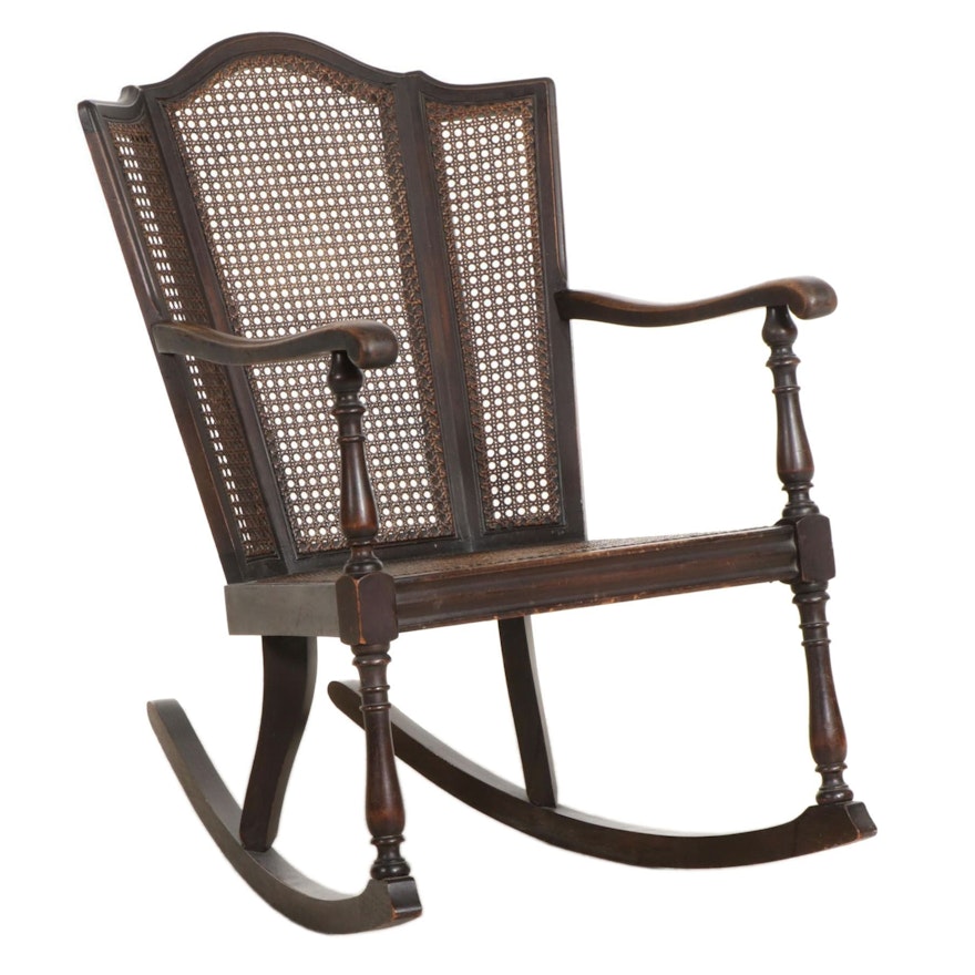 Queen Anne Style Ebonized and Caned Wingback Rocking Armchair