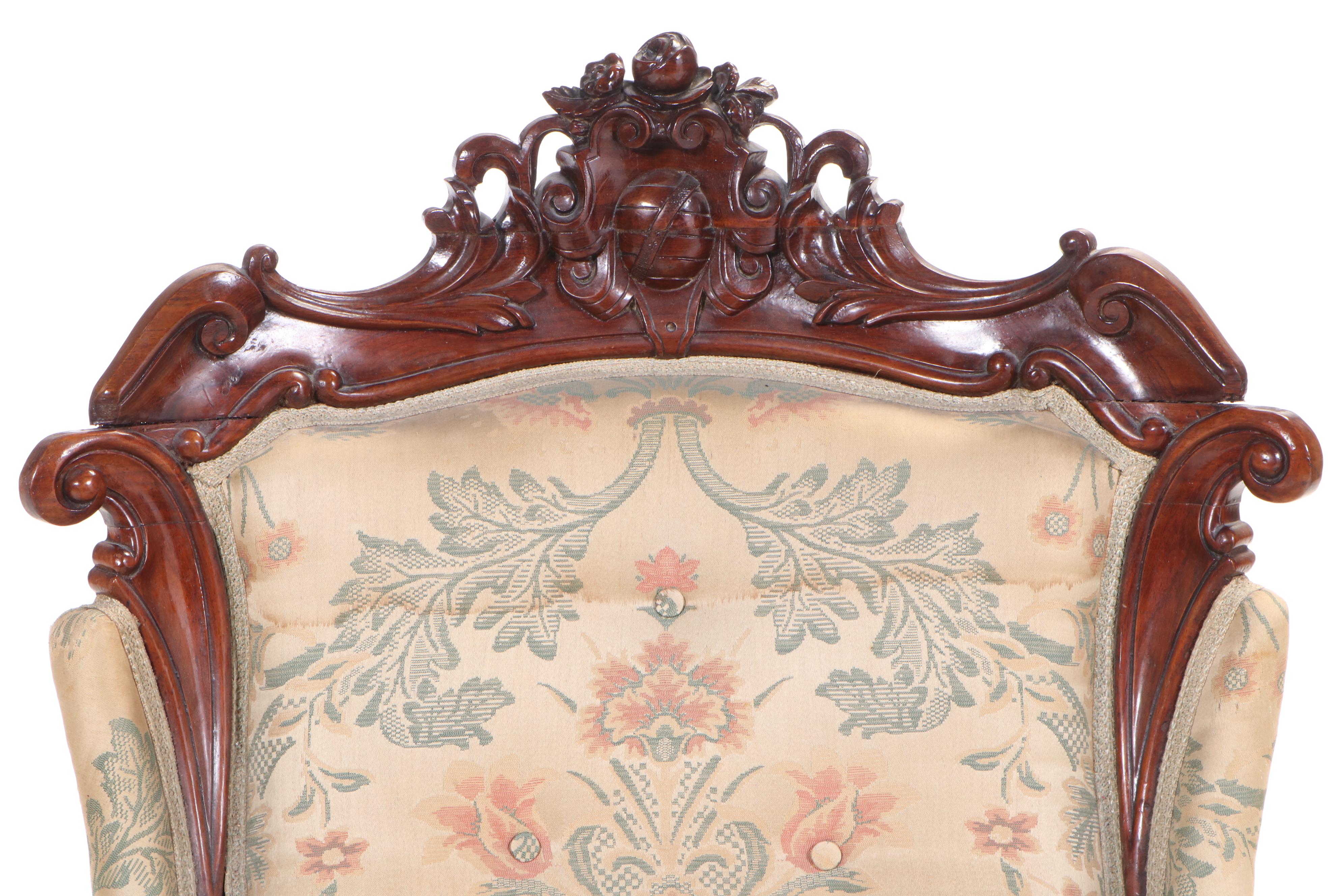 American Rococo Revival Carved Rosewood and Buttoned-Down Armchair