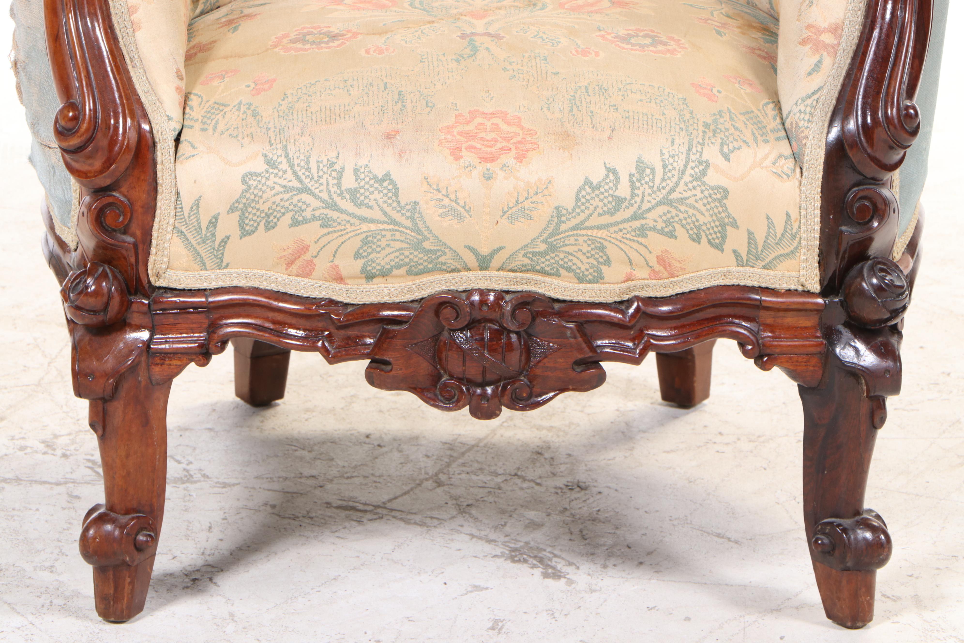 American Rococo Revival Carved Rosewood and Buttoned-Down Armchair