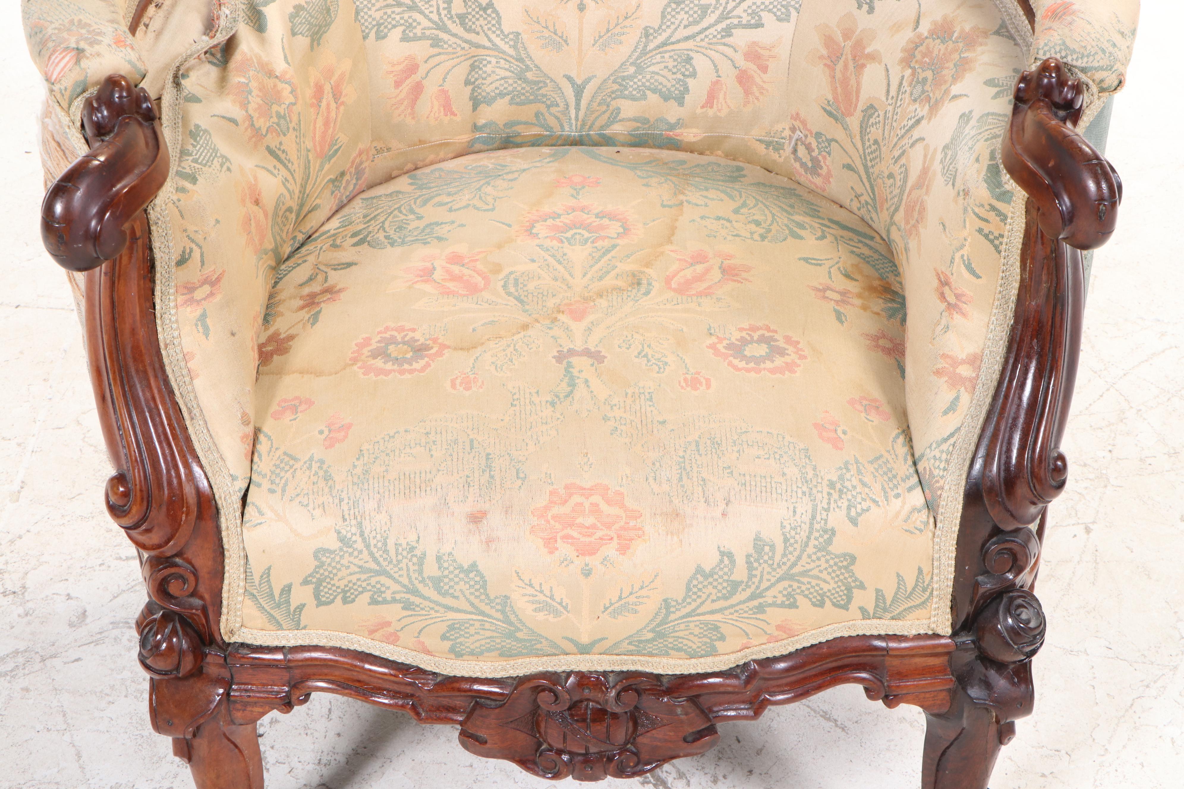 American Rococo Revival Carved Rosewood and Buttoned-Down Armchair