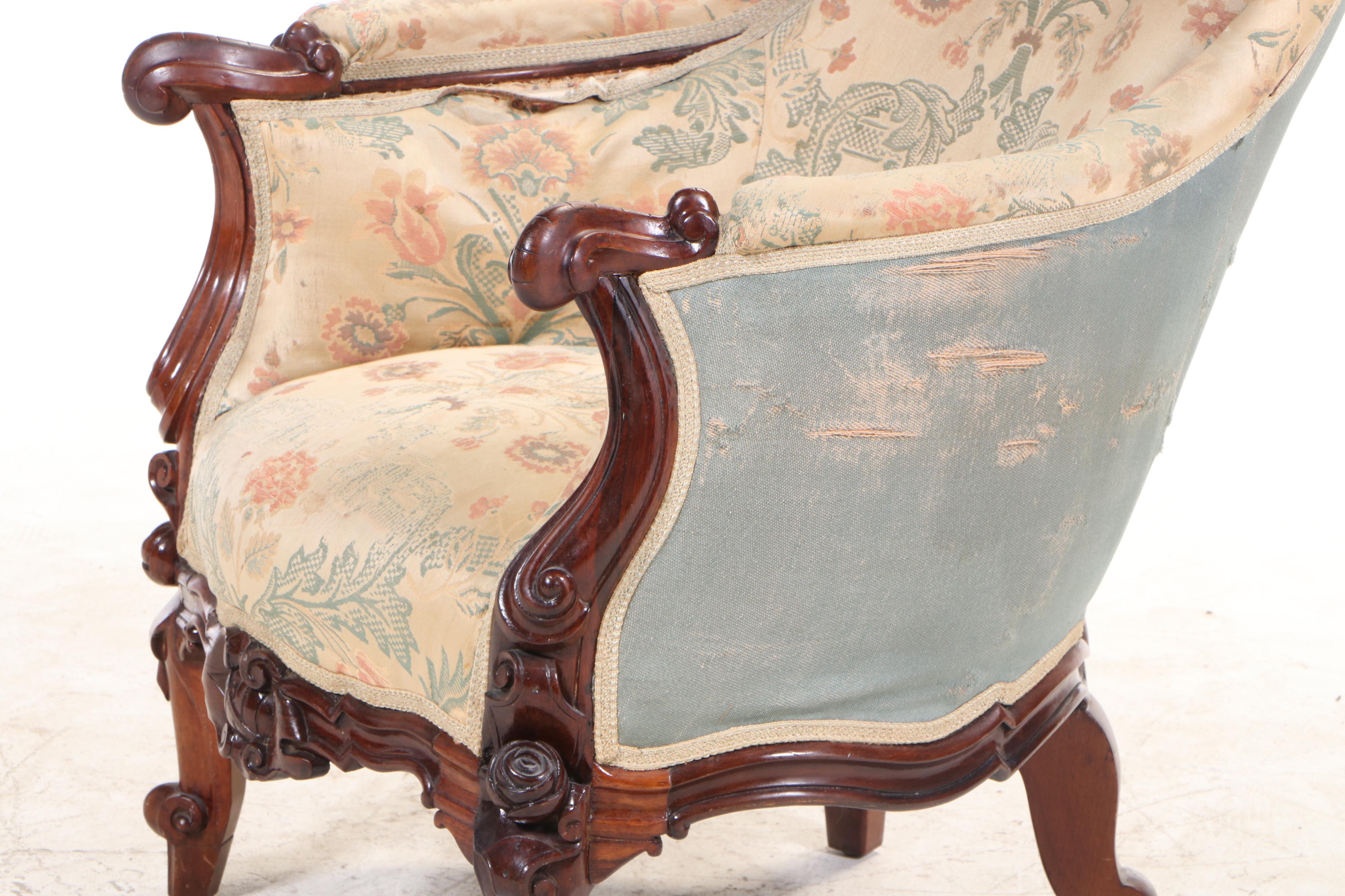 American Rococo Revival Carved Rosewood and Buttoned-Down Armchair