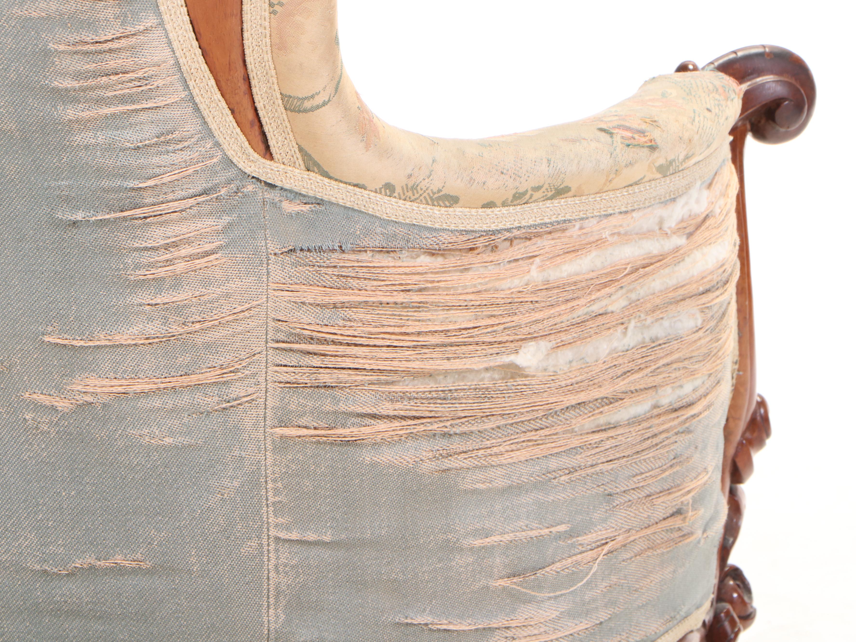 American Rococo Revival Carved Rosewood and Buttoned-Down Armchair