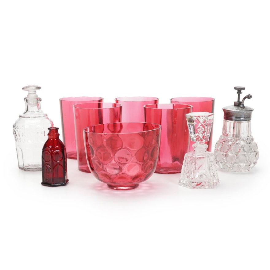 Cranberry Glass Optic Juice Glass With Bottles and Thumbprint Votive Holder