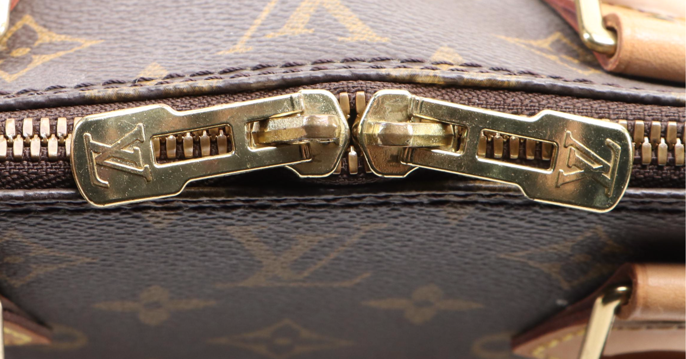 Louis Vuitton Alma PM in Monogram Canvas and Vachetta Leather